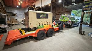 New dry sandblasting trailer from Green Mountain Powder Coating inside workshop before painting and vinyl wrap