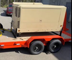 375 CFM mobile dry sandblasting trailer transformed from tan to branded rolling billboard by GM Powder Coating
