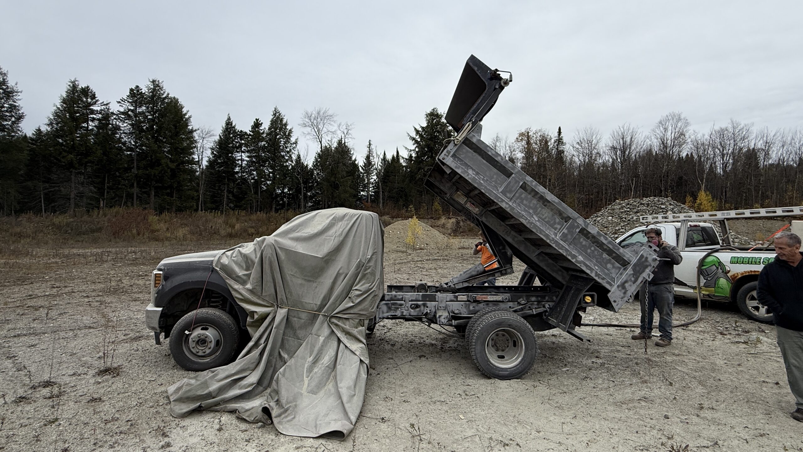 Dump Truck Bed Sandblasting – Pit Day 2025 in Eden Vermont Dump truck bed sandblasting during Pit Day 2025 by Green Mountain Mobile Sandblasting and Powder Coating