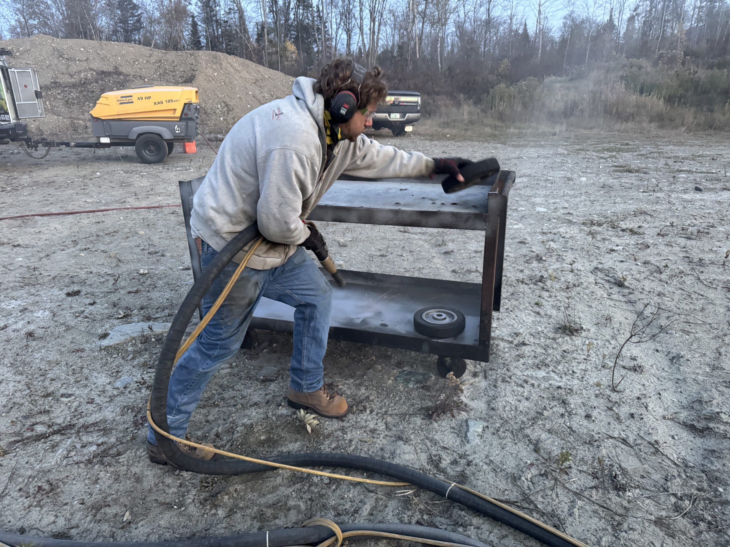 Restored 1940s Metal Workbench – Fire-Damaged Heirloom Refinished 1940s or 1950s fire-damaged metal workbench restored and painted by Green Mountain Mobile Sandblasting and Powder Coating
