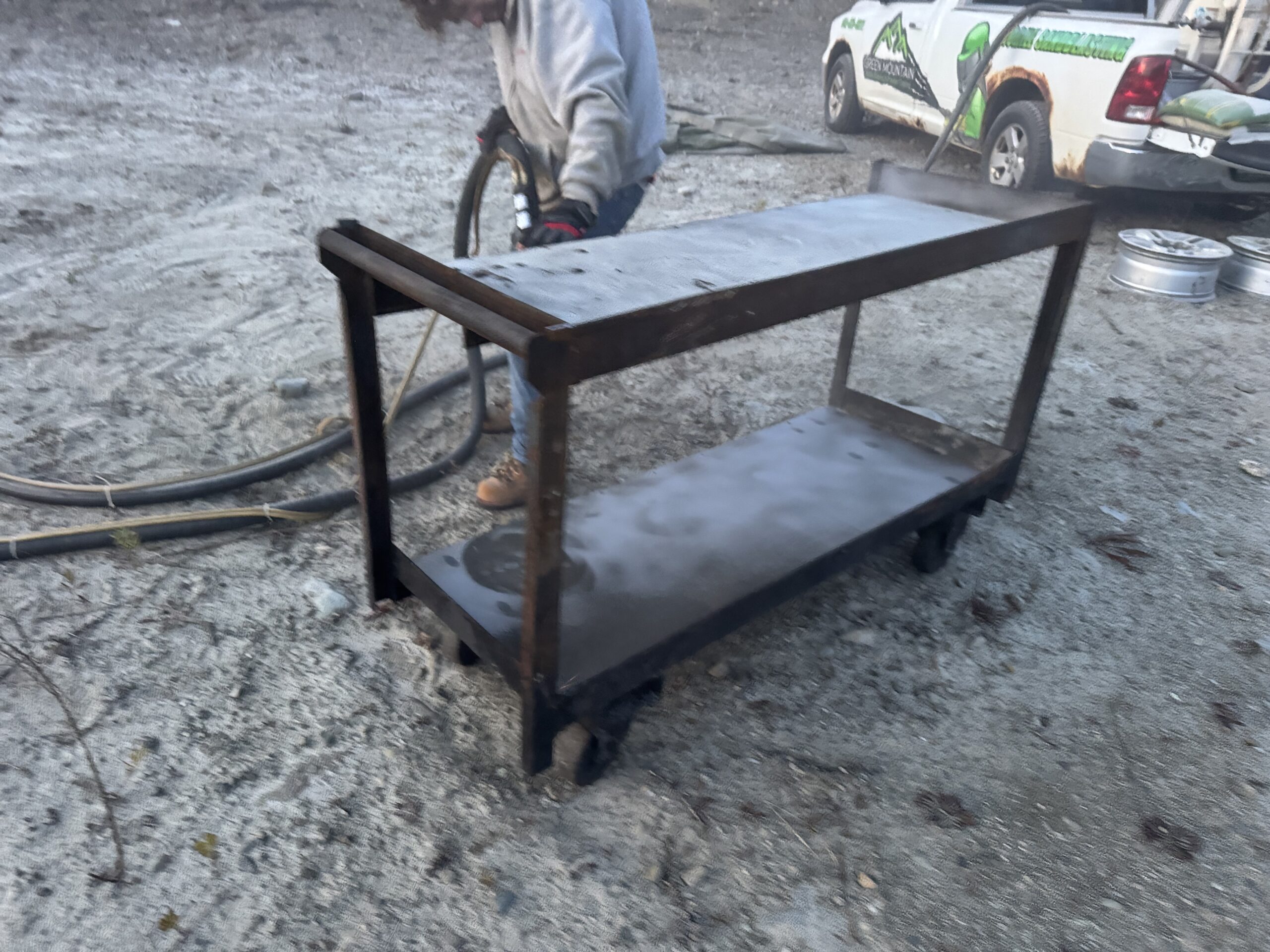Restored 1940s Metal Workbench – Fire-Damaged Heirloom Refinished 1940s or 1950s fire-damaged metal workbench restored and painted by Green Mountain Mobile Sandblasting and Powder Coating