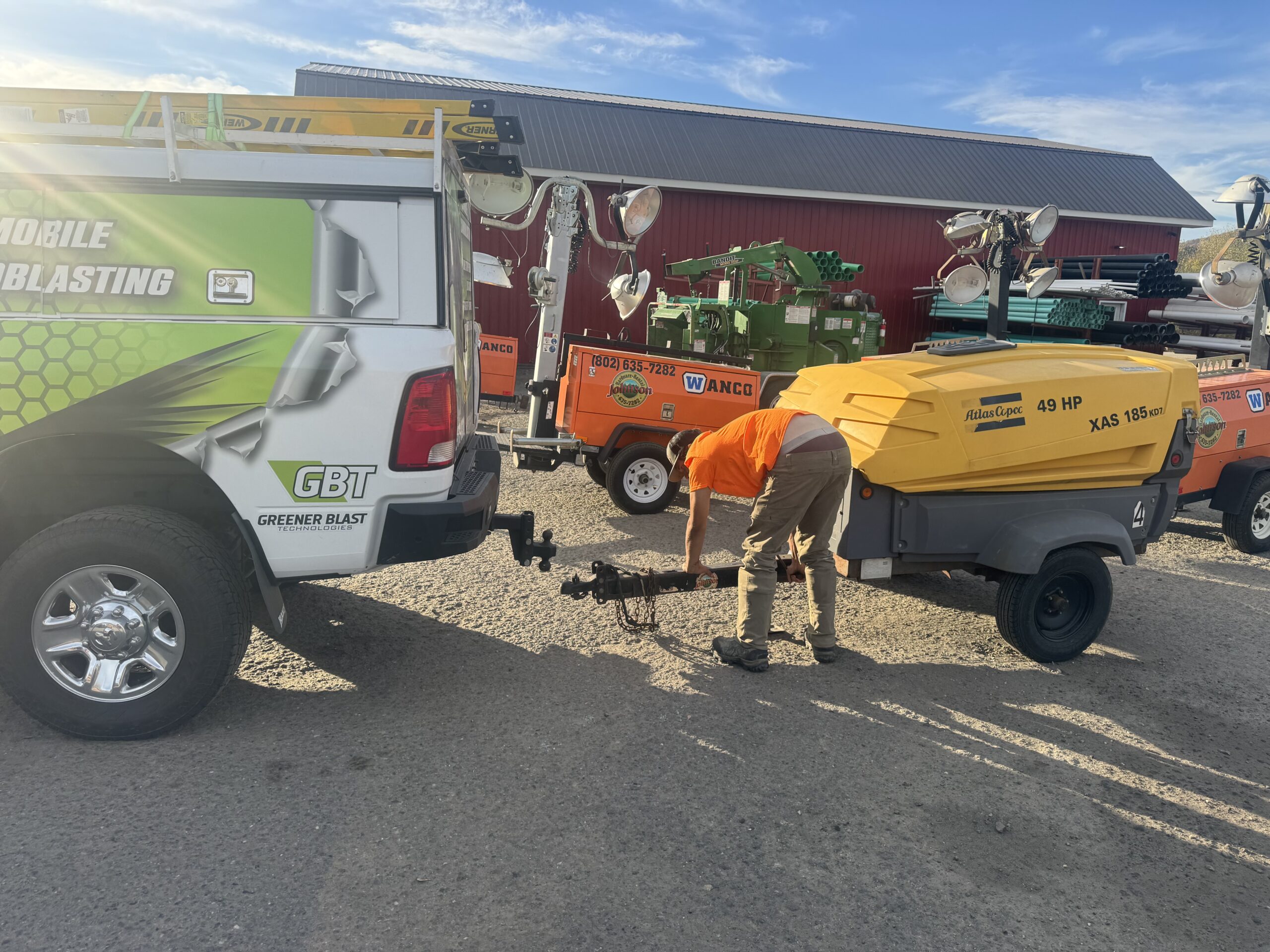 Loading Rental Compressor – Main Unit O-Ring Failure Team member loading rental compressor onto GMPC truck after main compressor O-ring failure