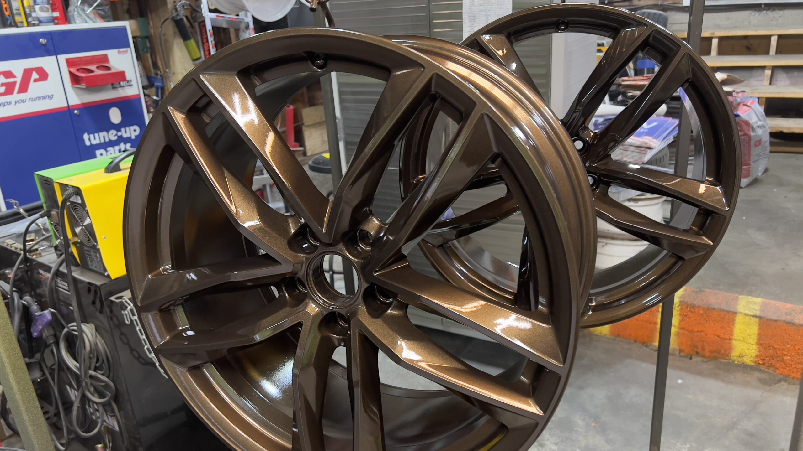 Bronze Powder Coated Rims – Custom Finish with Video Showcase Set of rims powder coated in bronze by Green Mountain Mobile Sandblasting and Powder Coating with YouTube video link