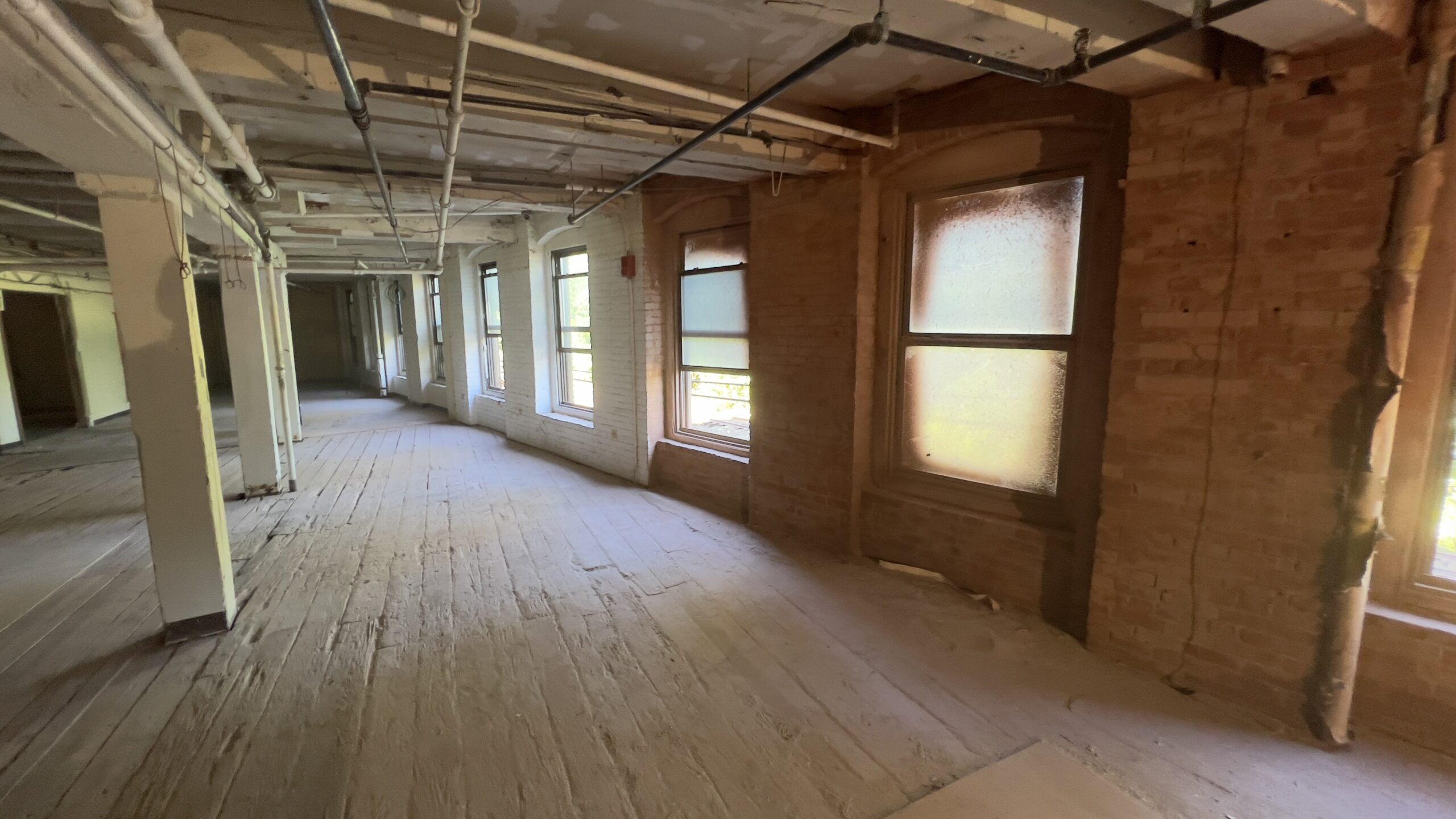 Historic Brick Restoration – Brattleboro VT Newspaper Factory Brick walls at old newspaper factory in Brattleboro Vermont sandblasted by Green Mountain Mobile Sandblasting and Powder Coating