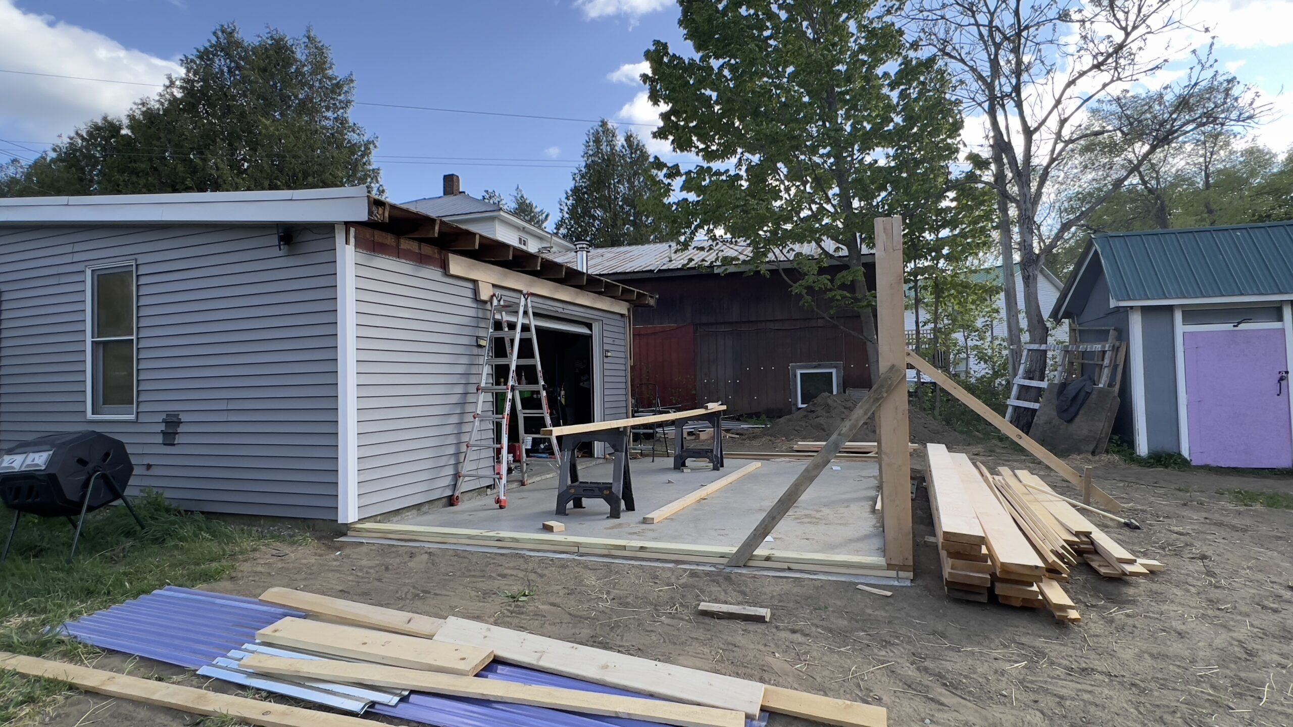 Powder Coating Shop Expansion – Build-On Addition Project Build-on addition behind powder coating shop by Green Mountain Mobile Sandblasting and Powder Coating replacing former sandblasting carport