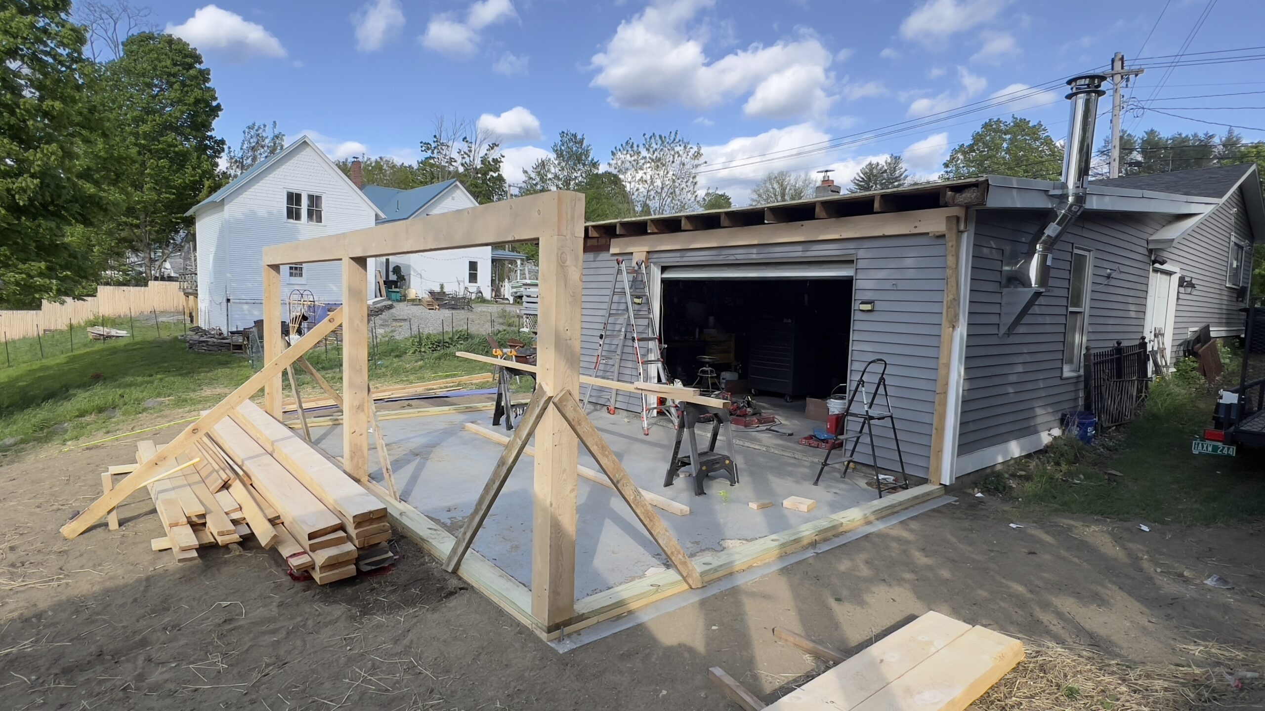 Powder Coating Shop Expansion – Build-On Addition Project Build-on addition behind powder coating shop by Green Mountain Mobile Sandblasting and Powder Coating replacing former sandblasting carport