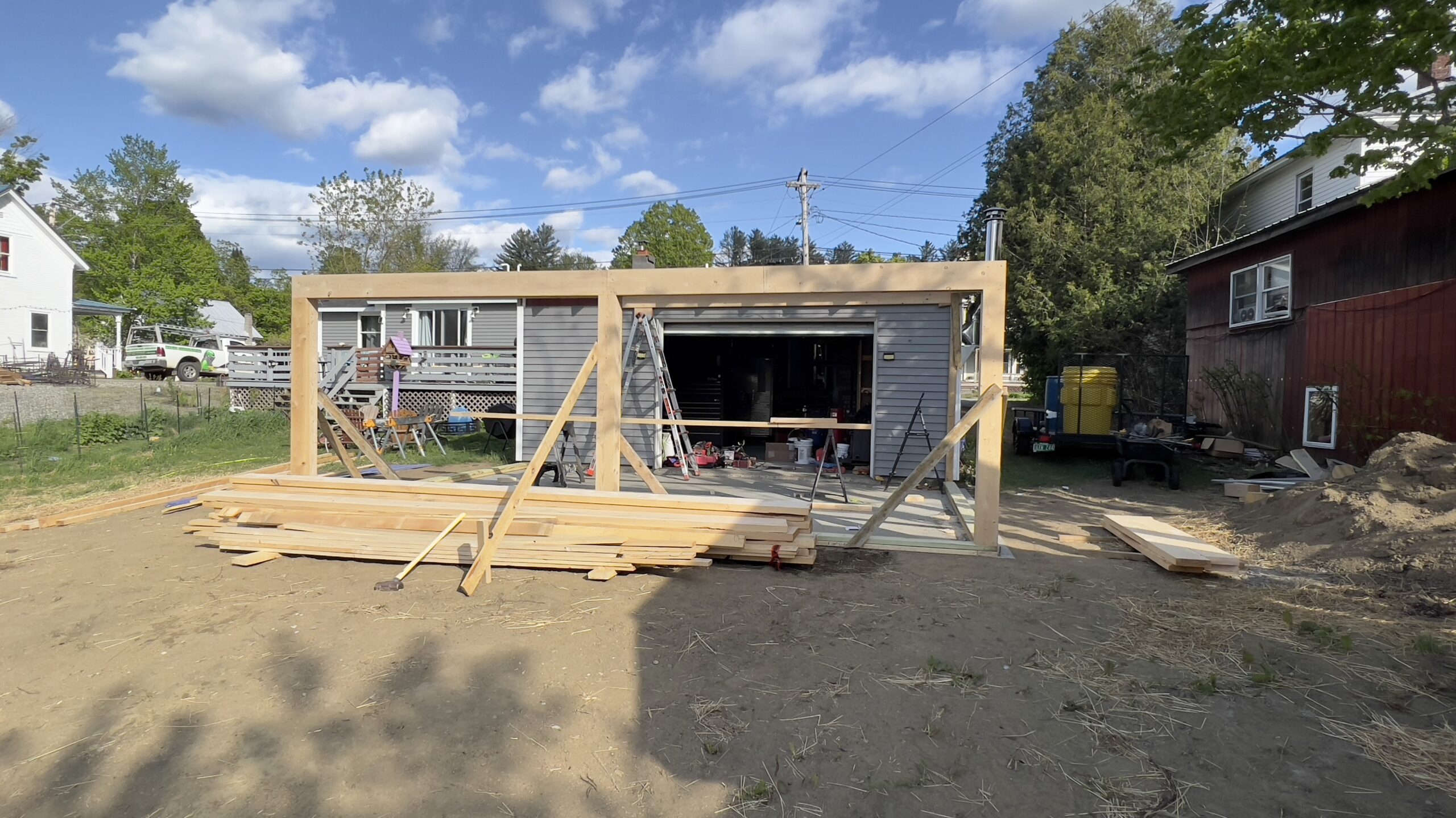 Powder Coating Shop Expansion – Build-On Addition Project Build-on addition behind powder coating shop by Green Mountain Mobile Sandblasting and Powder Coating replacing former sandblasting carport