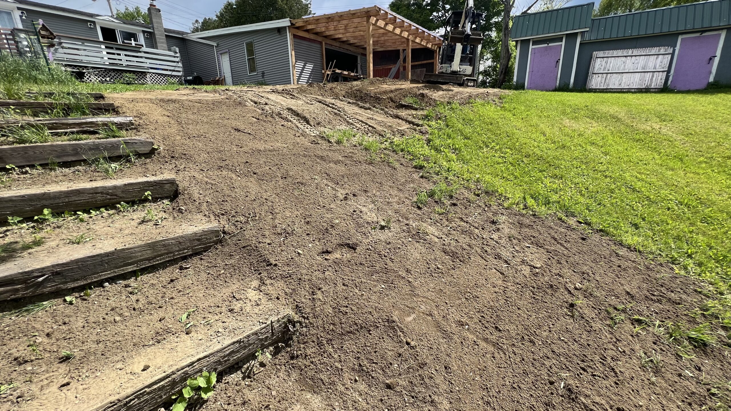 Powder Coating Shop Expansion – Build-On Addition Project Build-on addition behind powder coating shop by Green Mountain Mobile Sandblasting and Powder Coating replacing former sandblasting carport