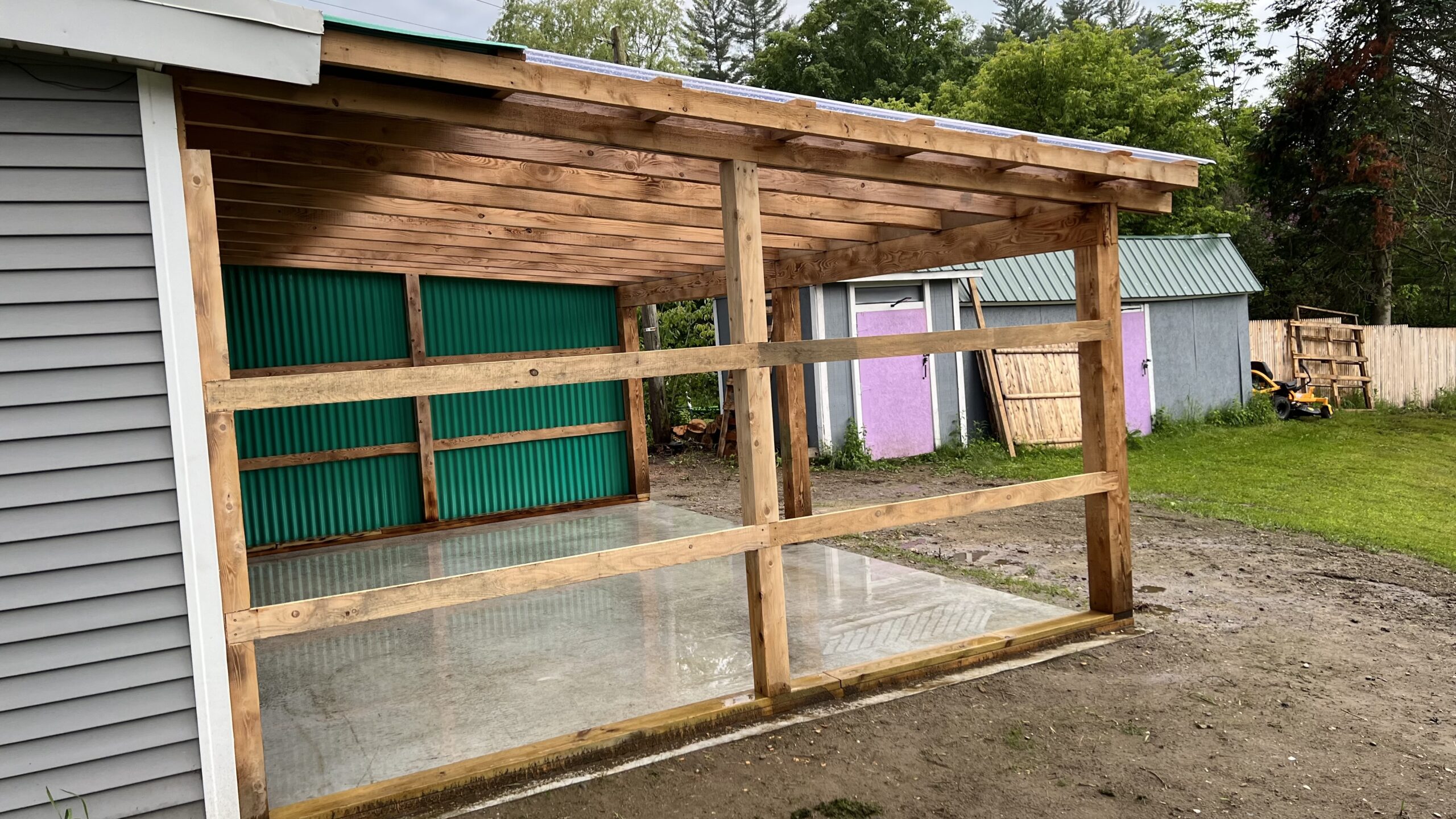 Powder Coating Shop Expansion – Build-On Addition Project Build-on addition behind powder coating shop by Green Mountain Mobile Sandblasting and Powder Coating replacing former sandblasting carport