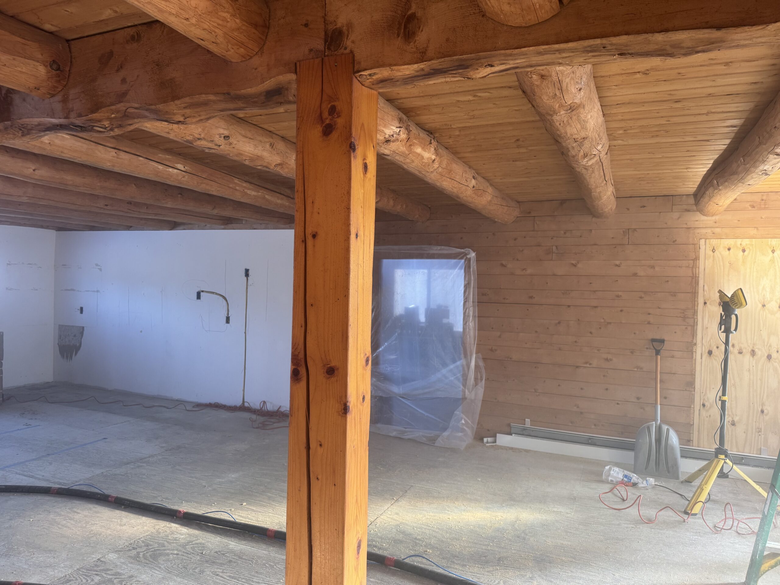 Ceiling Beam Sandblasting – Craftsbury VT Precision Woodwork Ceiling wood beams sandblasted by Green Mountain Mobile Sandblasting and Powder Coating in Craftsbury Vermont with T&G areas left untouched