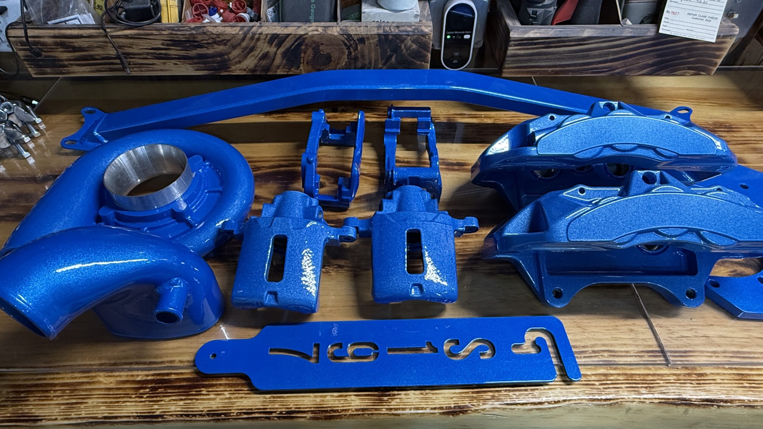 Illusion Blue Powder Coating – Brembo, Ford Calipers, Strut Brace & Turbo Brembo calipers, Ford calipers, strut brace, and turbo powder coated in illusion blue by Green Mountain Mobile