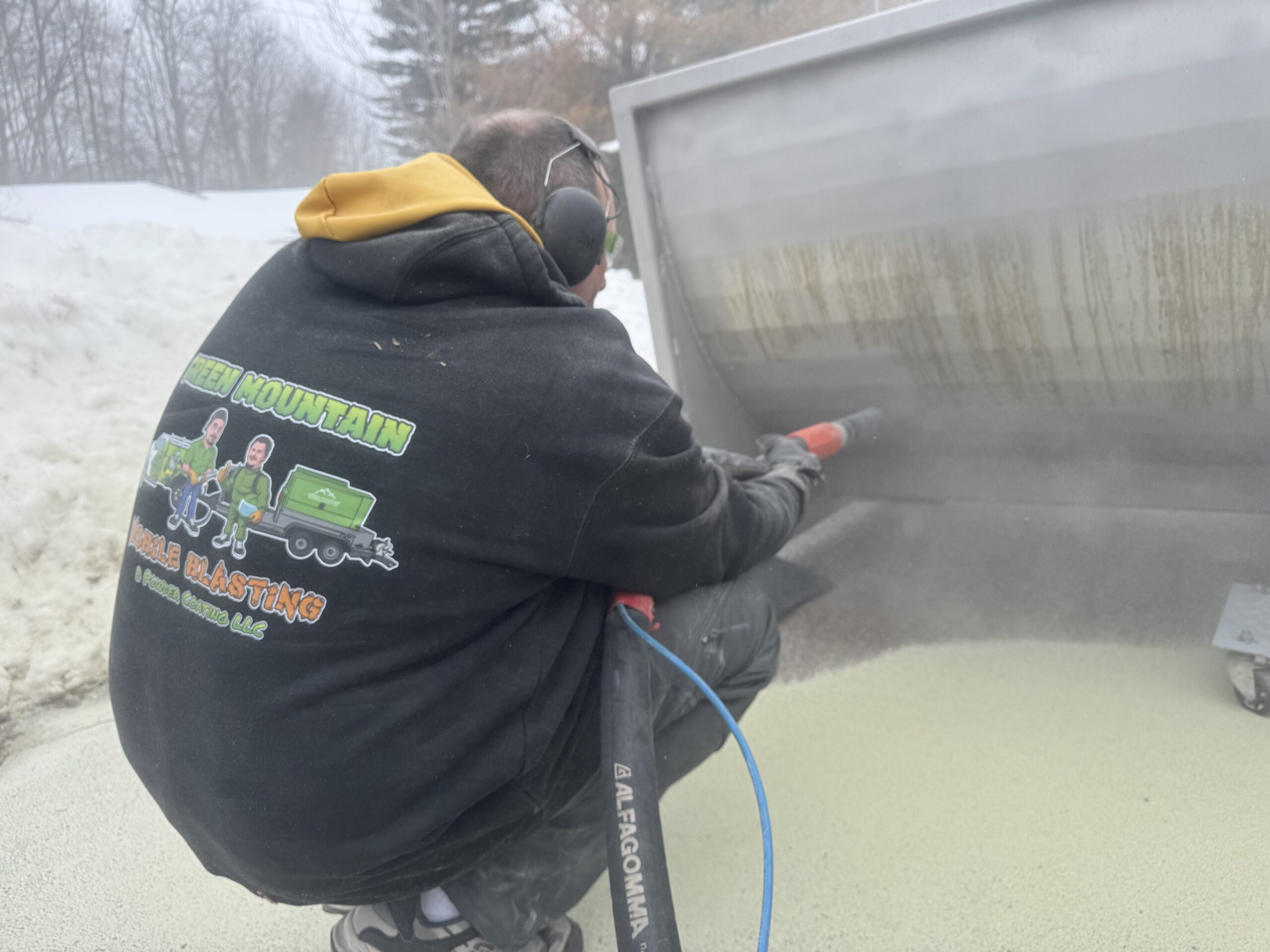 Sandblasting Rust Off a Stainless Steel Cleaning Tank Stainless steel cleaning tank with rust removed by sandblasting from Green Mountain Mobile Sandblasting and Powder Coating LLC