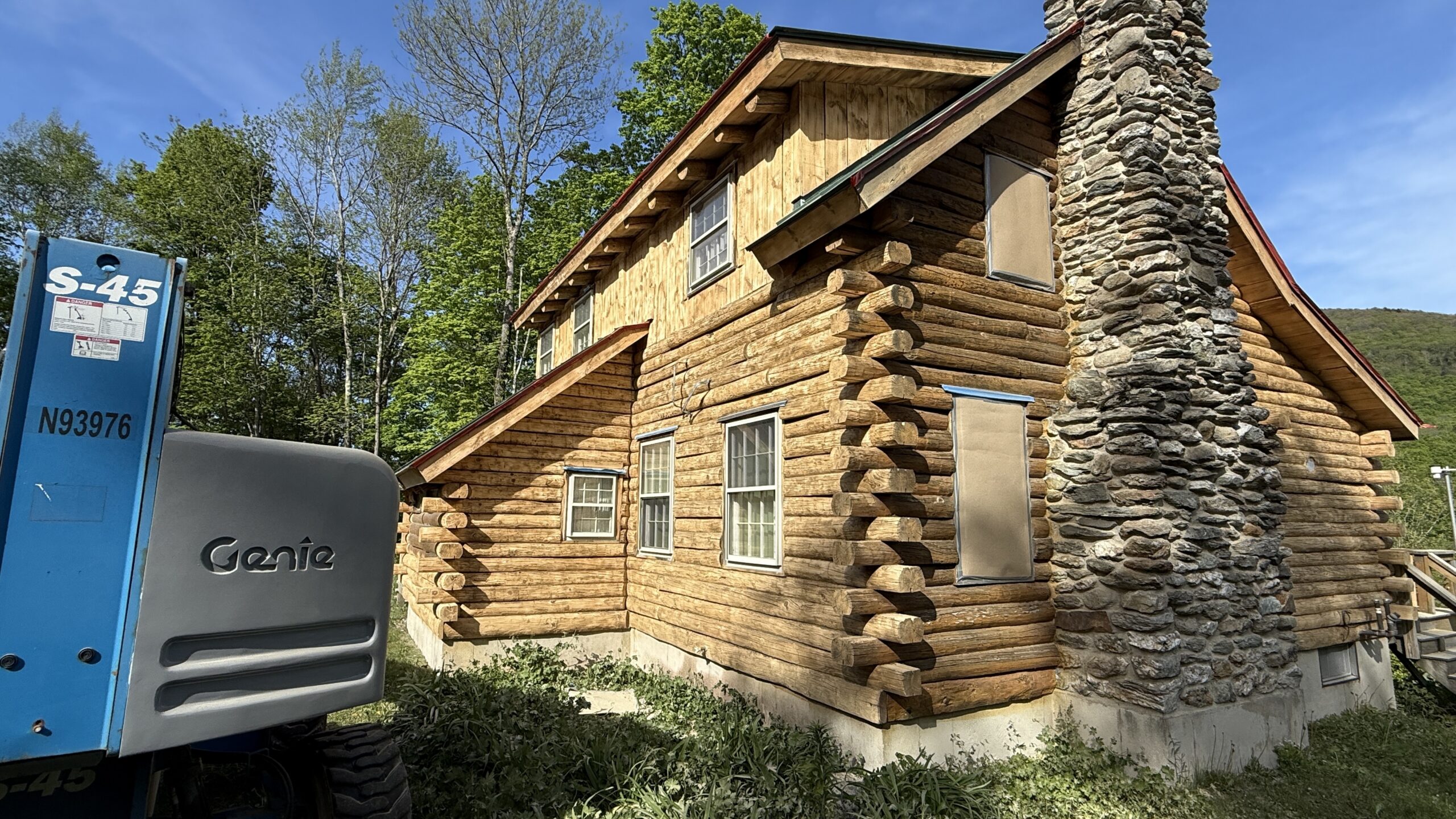 Northern Vermont Log Cabin – Before & After Sandblasting Log cabin sandblasting project in Northern Vermont showing before during and after restoration by Green Mountain Sandblasting and Powder Coating LLC