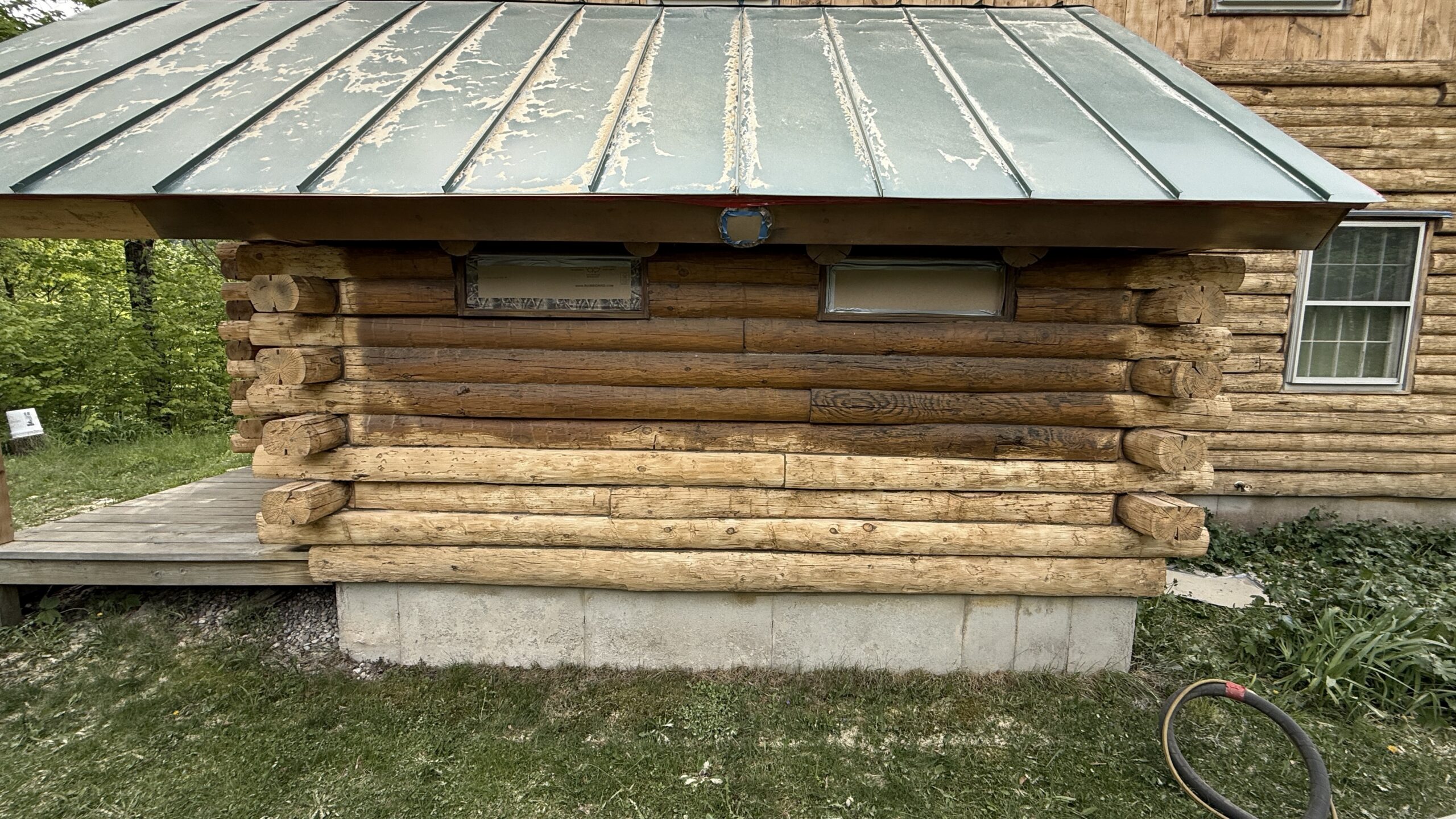 Northern Vermont Log Cabin – Before & After Sandblasting Log cabin sandblasting project in Northern Vermont showing before during and after restoration by Green Mountain Sandblasting and Powder Coating LLC