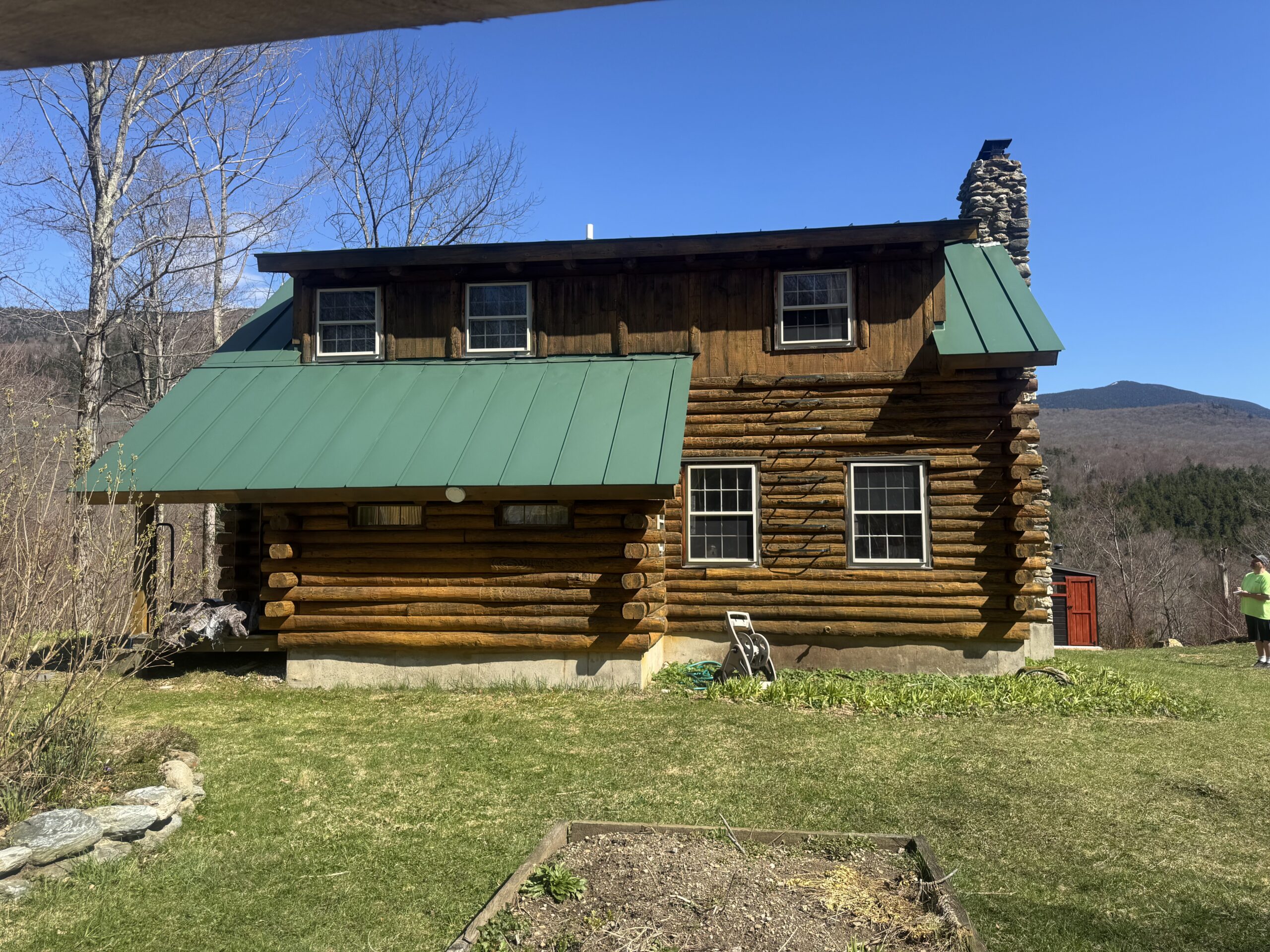 Northern Vermont Log Cabin – Before & After Sandblasting Log cabin sandblasting project in Northern Vermont showing before during and after restoration by Green Mountain Sandblasting and Powder Coating LLC