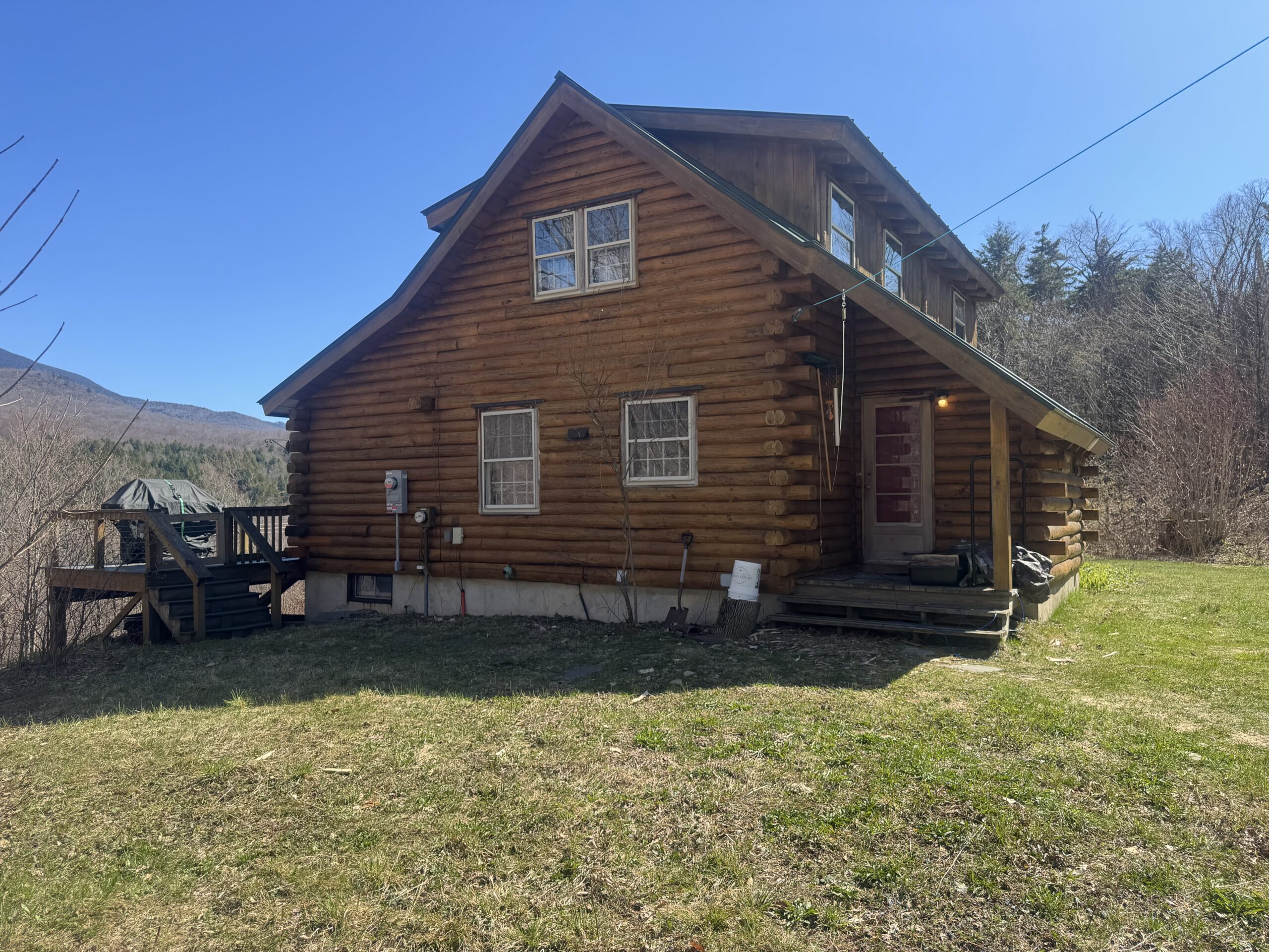 Northern Vermont Log Cabin – Before & After Sandblasting Log cabin sandblasting project in Northern Vermont showing before during and after restoration by Green Mountain Sandblasting and Powder Coating LLC