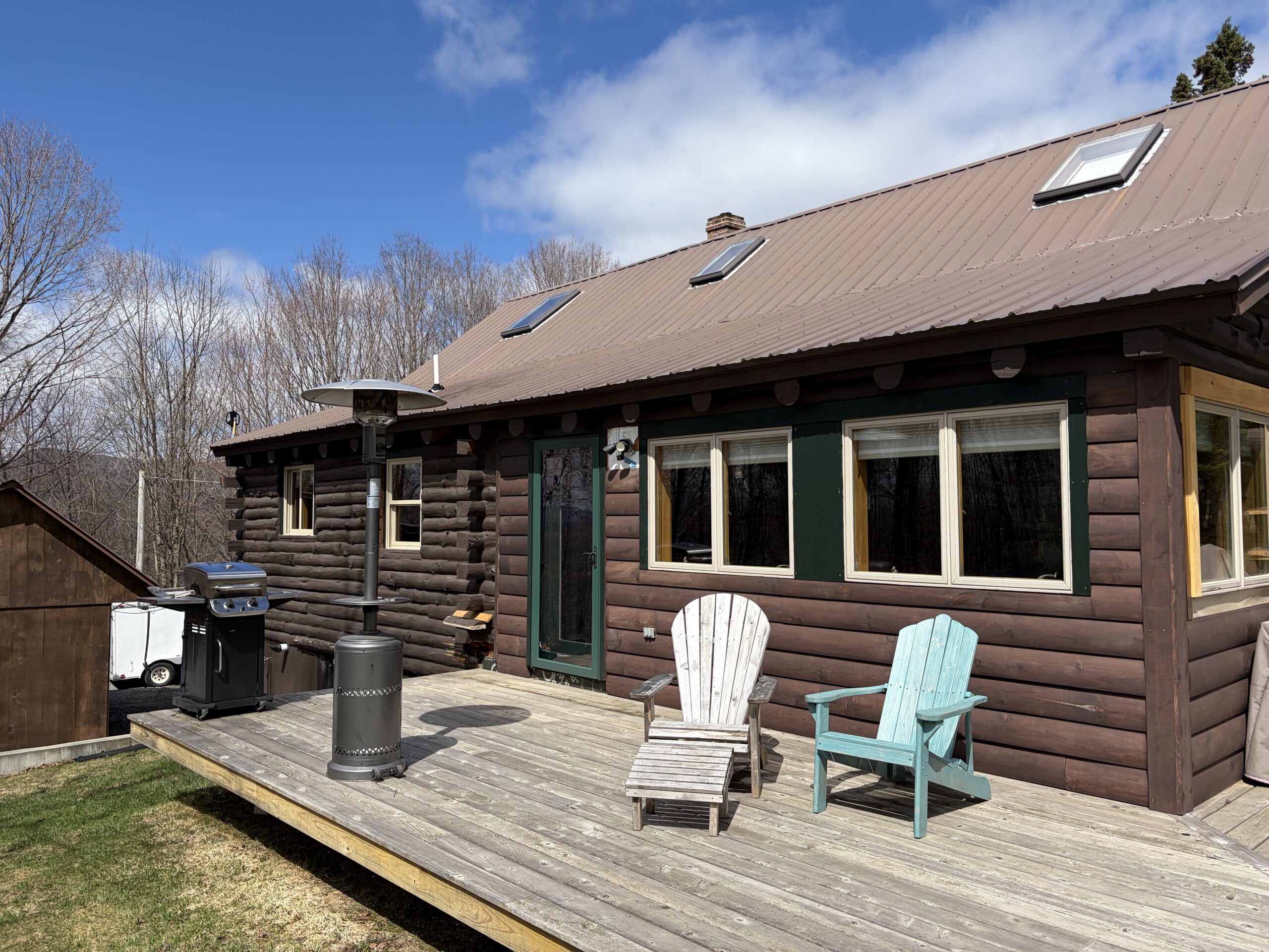 West Burke Log Cabin – Before, During & After Sandblasting Log cabin sandblasting project in West Burke Vermont showing before during and after restoration by Green Mountain Sandblasting and Powder Coating LLC