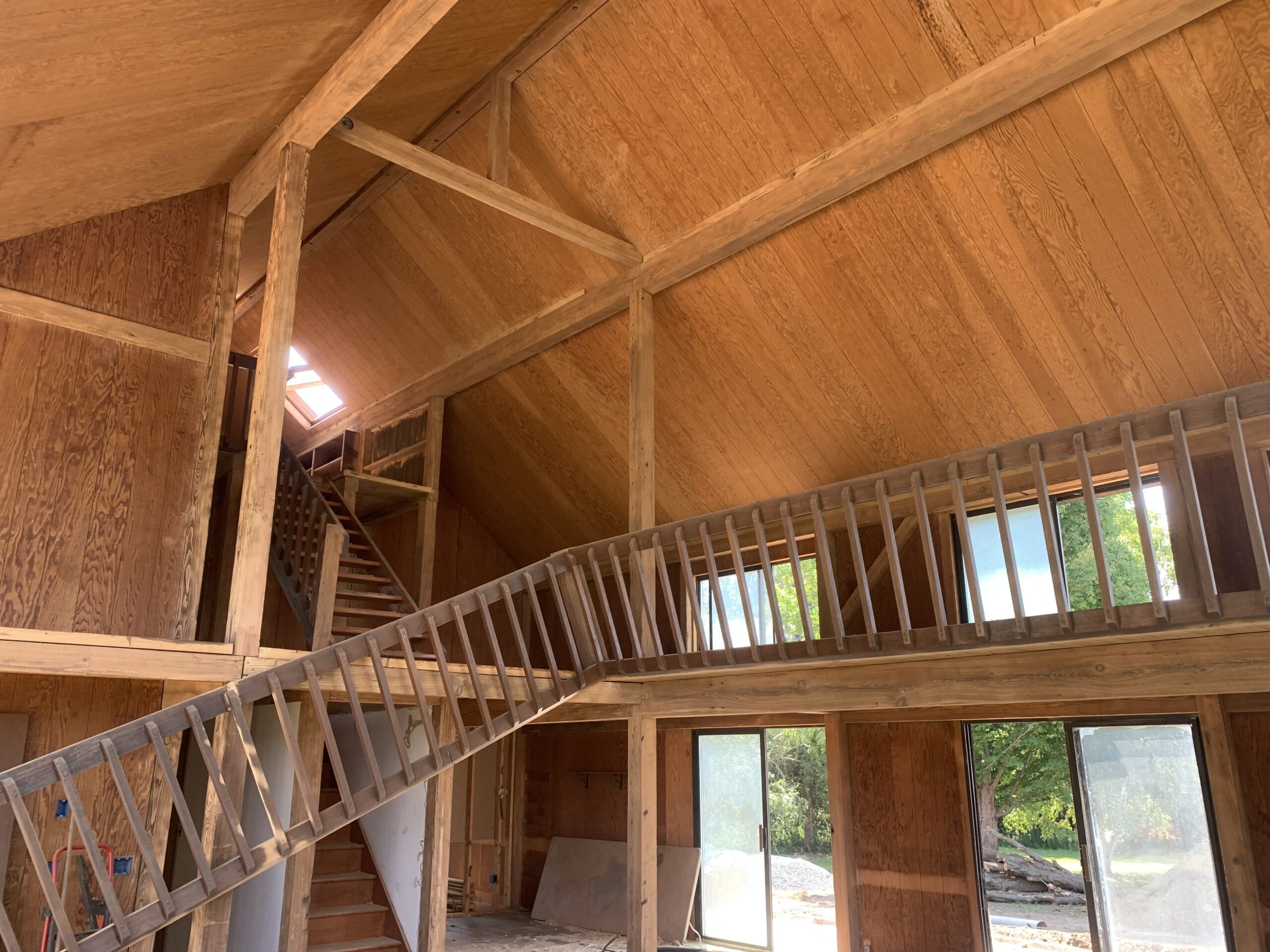 Lake Champlain Cabin – Interior Wood Sandblasting Restoration Cabin interior ceilings and wood beams sandblasted on Lake Champlain by Green Mountain Sandblasting and Powder Coating LLC showing before during and after restoration