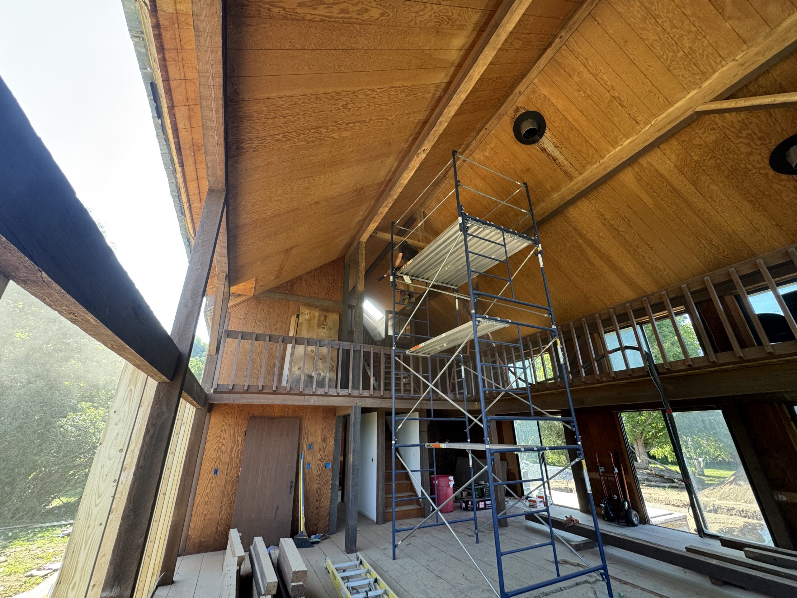 Lake Champlain Cabin – Interior Wood Sandblasting Restoration Cabin interior ceilings and wood beams sandblasted on Lake Champlain by Green Mountain Sandblasting and Powder Coating LLC showing before during and after restoration