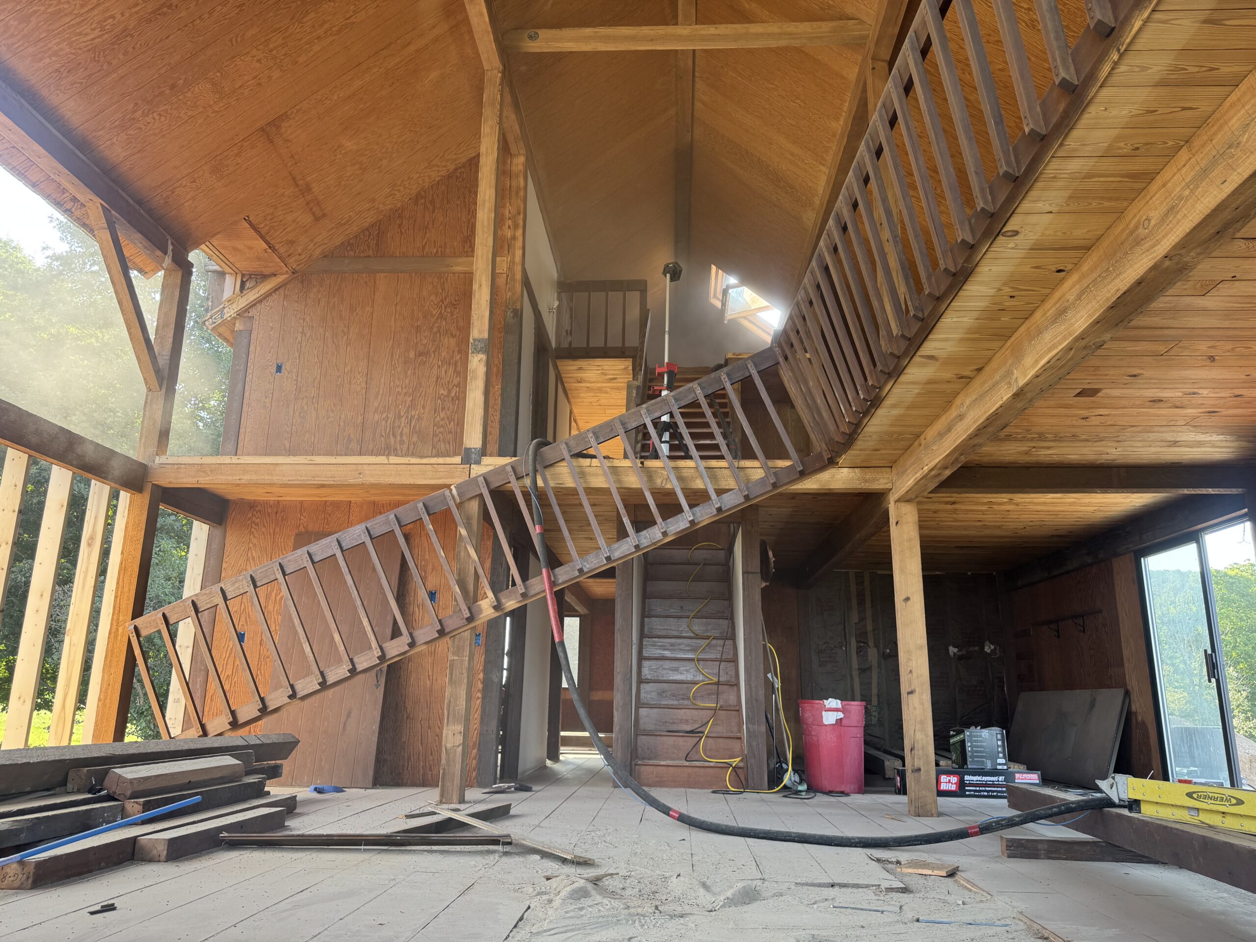 Lake Champlain Cabin – Interior Wood Sandblasting Restoration Cabin interior ceilings and wood beams sandblasted on Lake Champlain by Green Mountain Sandblasting and Powder Coating LLC showing before during and after restoration