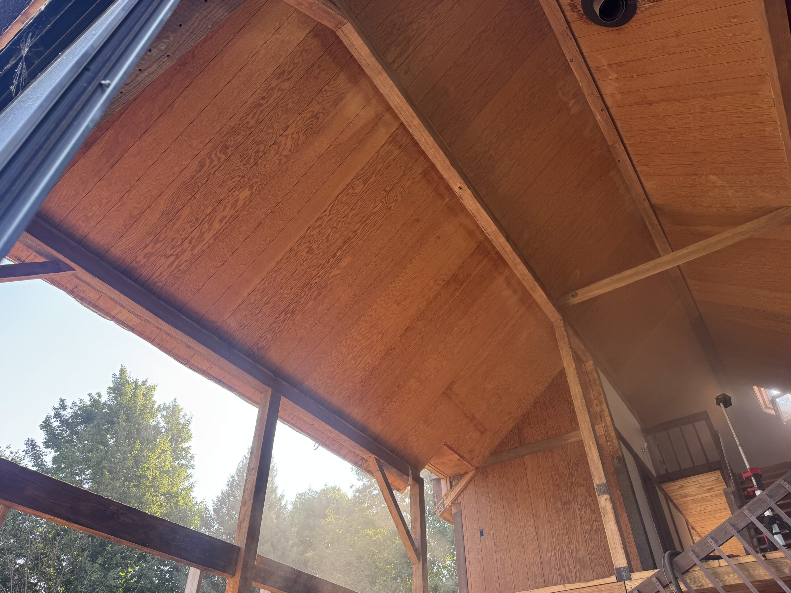 Lake Champlain Cabin – Interior Wood Sandblasting Restoration Cabin interior ceilings and wood beams sandblasted on Lake Champlain by Green Mountain Sandblasting and Powder Coating LLC showing before during and after restoration