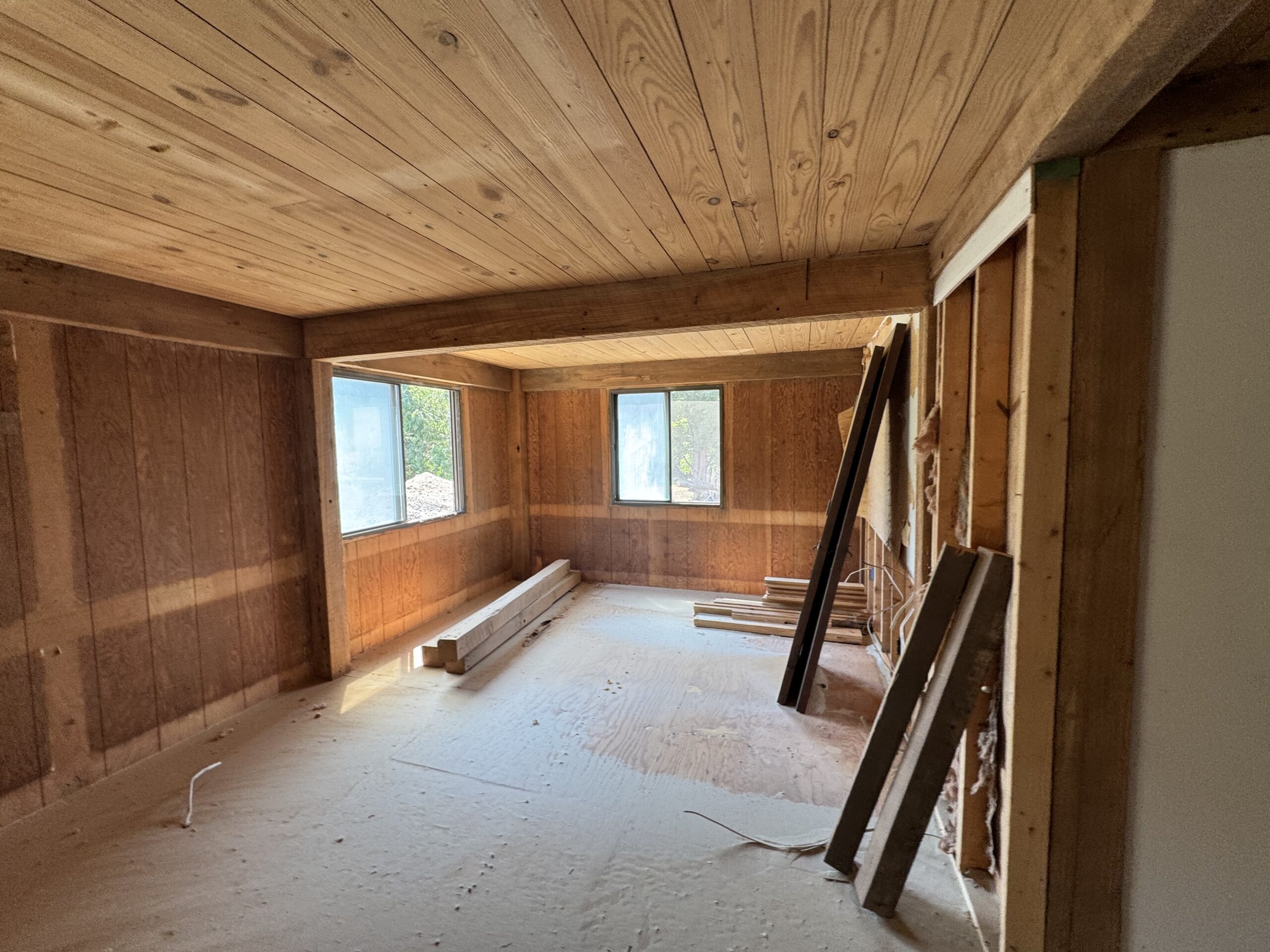Lake Champlain Cabin – Interior Wood Sandblasting Restoration Cabin interior ceilings and wood beams sandblasted on Lake Champlain by Green Mountain Sandblasting and Powder Coating LLC showing before during and after restoration