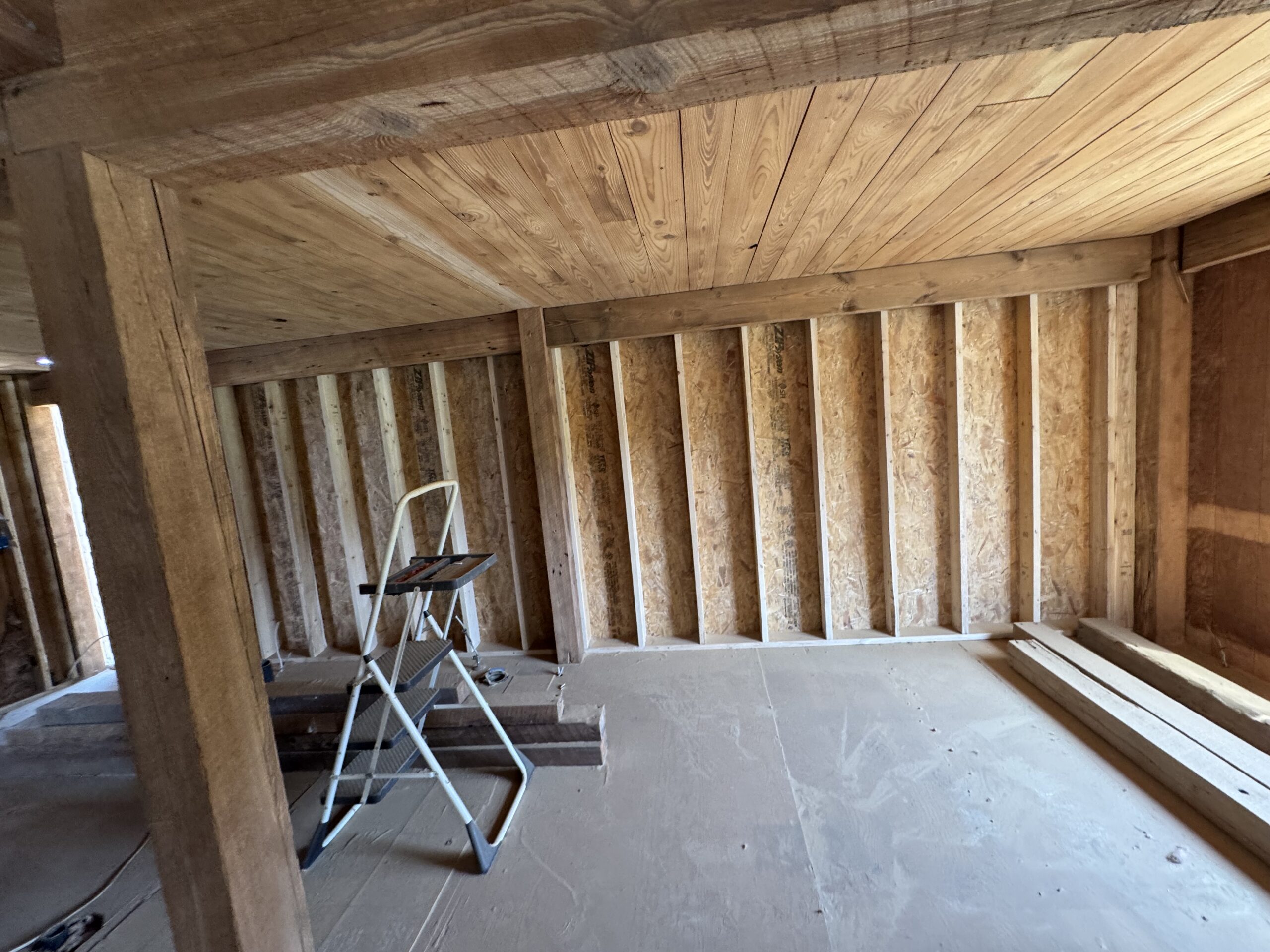 Lake Champlain Cabin – Interior Wood Sandblasting Restoration Cabin interior ceilings and wood beams sandblasted on Lake Champlain by Green Mountain Sandblasting and Powder Coating LLC showing before during and after restoration