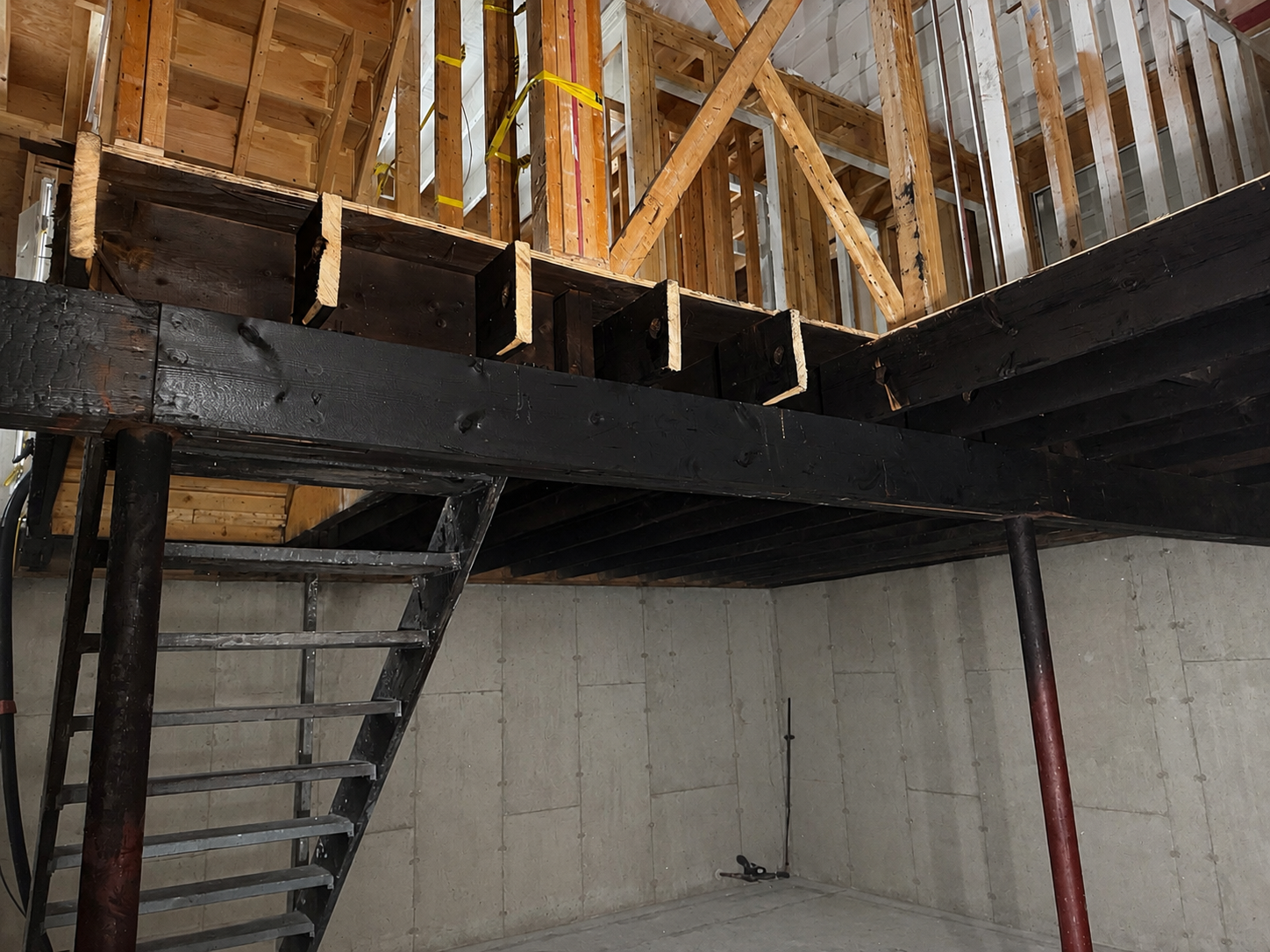 Fire Damage Restoration – Before & After Sandblasting Burned home before and after sandblasting restoration by Green Mountain Sandblasting and Powder Coating LLC for Phase Two Construction