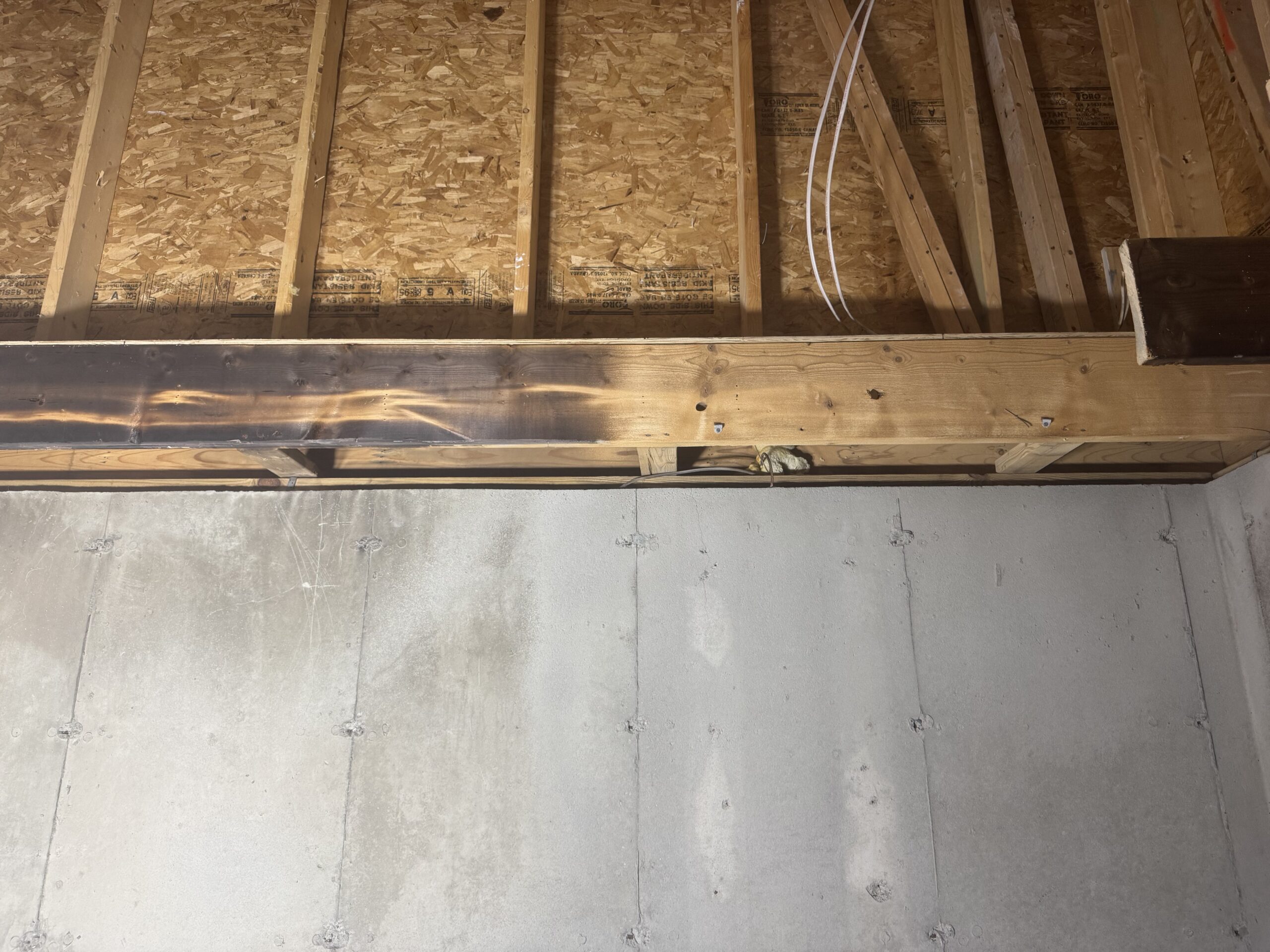 Fire Damage Restoration – Before & After Sandblasting Burned home before and after sandblasting restoration by Green Mountain Sandblasting and Powder Coating LLC for Phase Two Construction