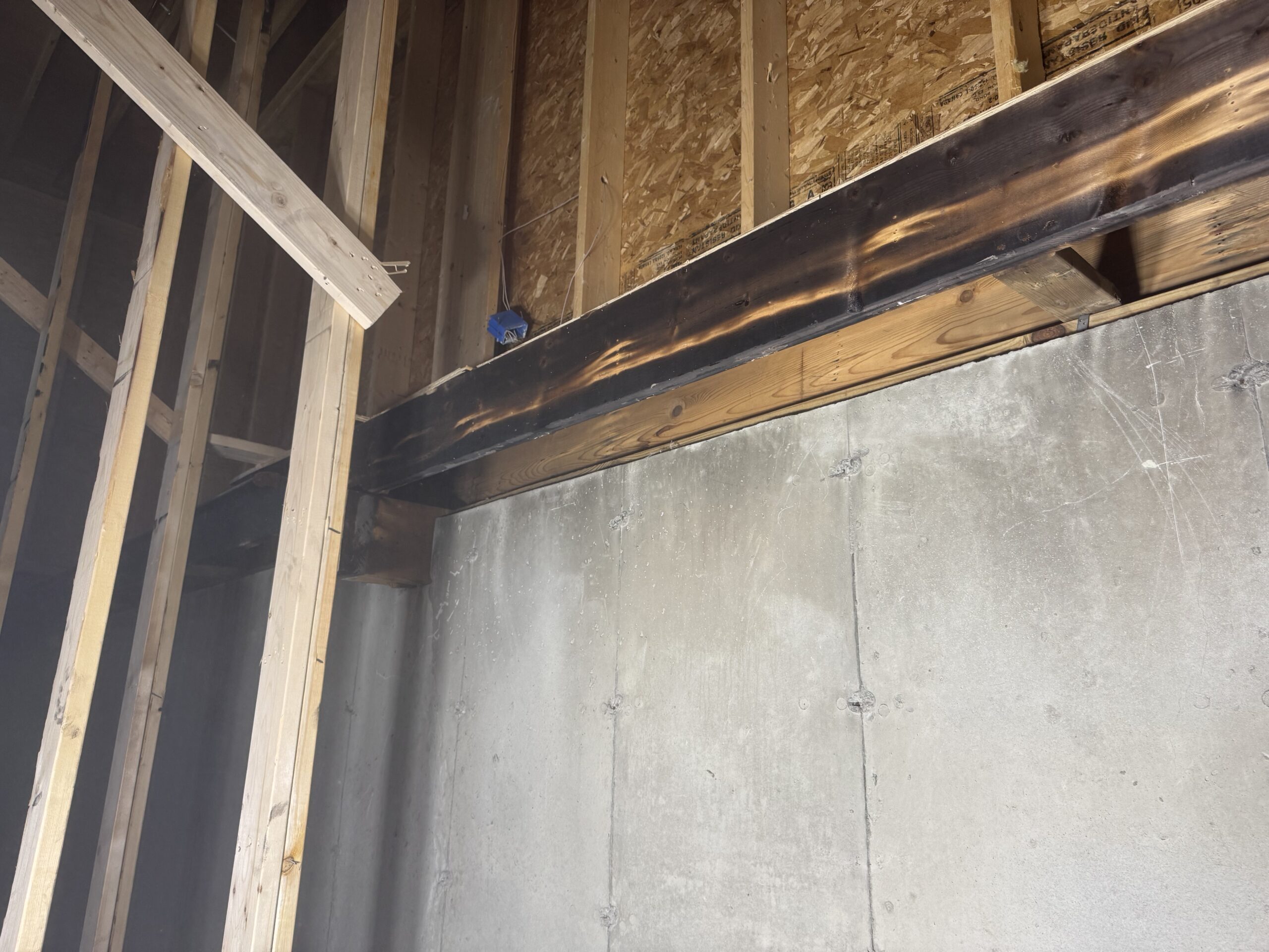 Fire Damage Restoration – Before & After Sandblasting Burned home before and after sandblasting restoration by Green Mountain Sandblasting and Powder Coating LLC for Phase Two Construction