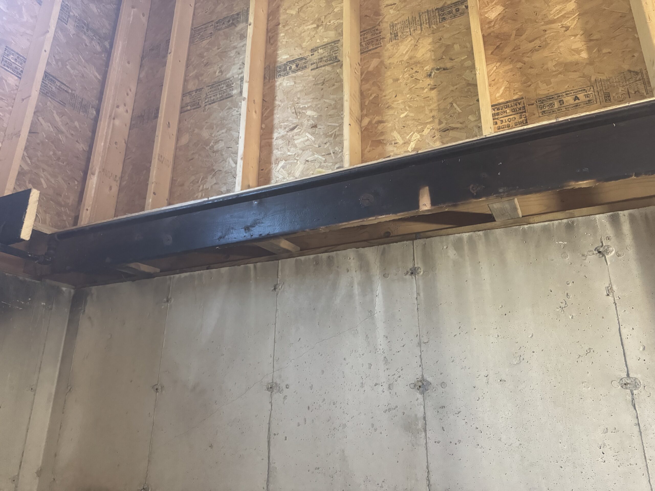 Fire Damage Restoration – Before & After Sandblasting Burned home before and after sandblasting restoration by Green Mountain Sandblasting and Powder Coating LLC for Phase Two Construction