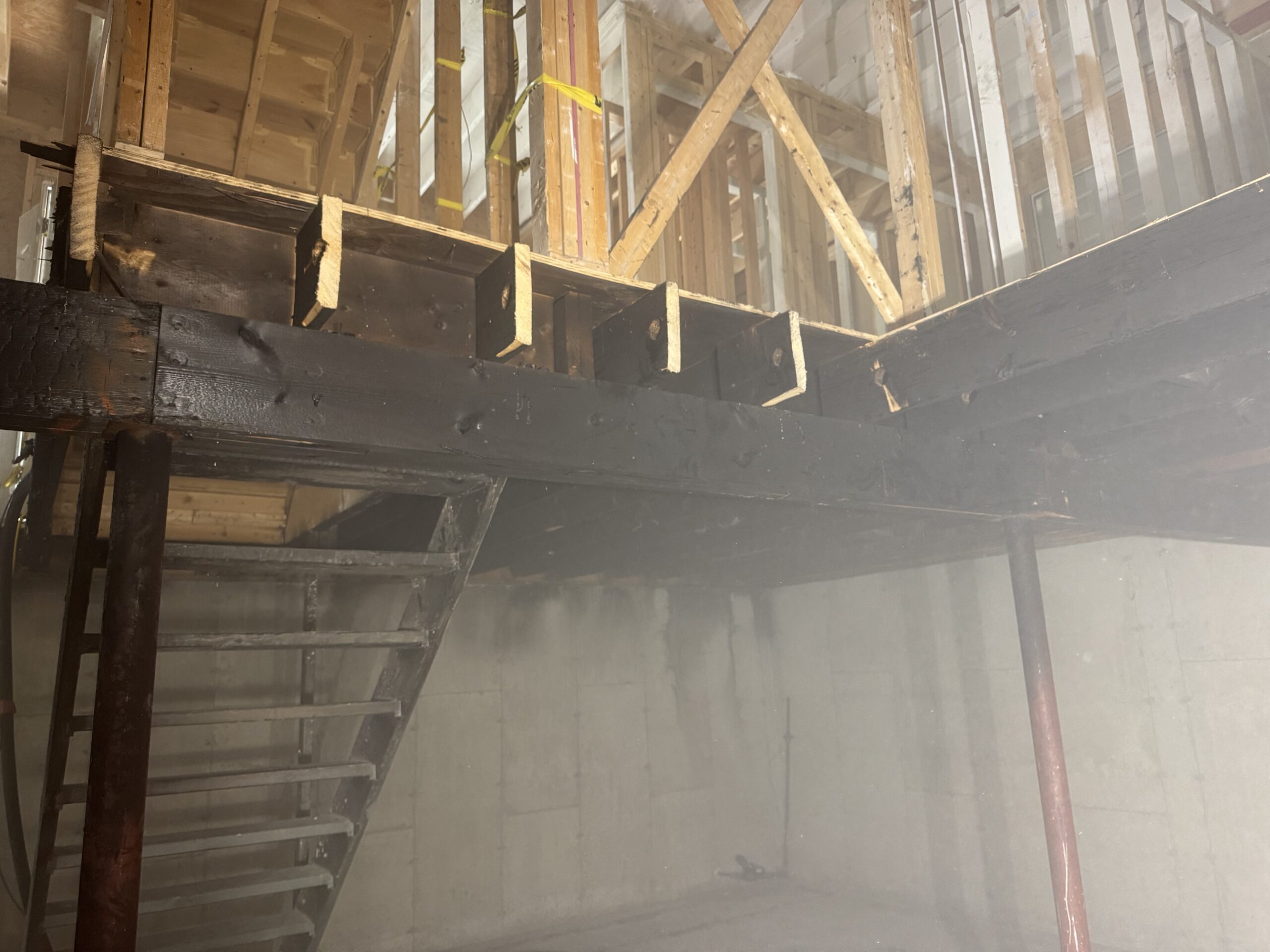 Fire Damage Restoration – Before & After Sandblasting Burned home before and after sandblasting restoration by Green Mountain Sandblasting and Powder Coating LLC for Phase Two Construction