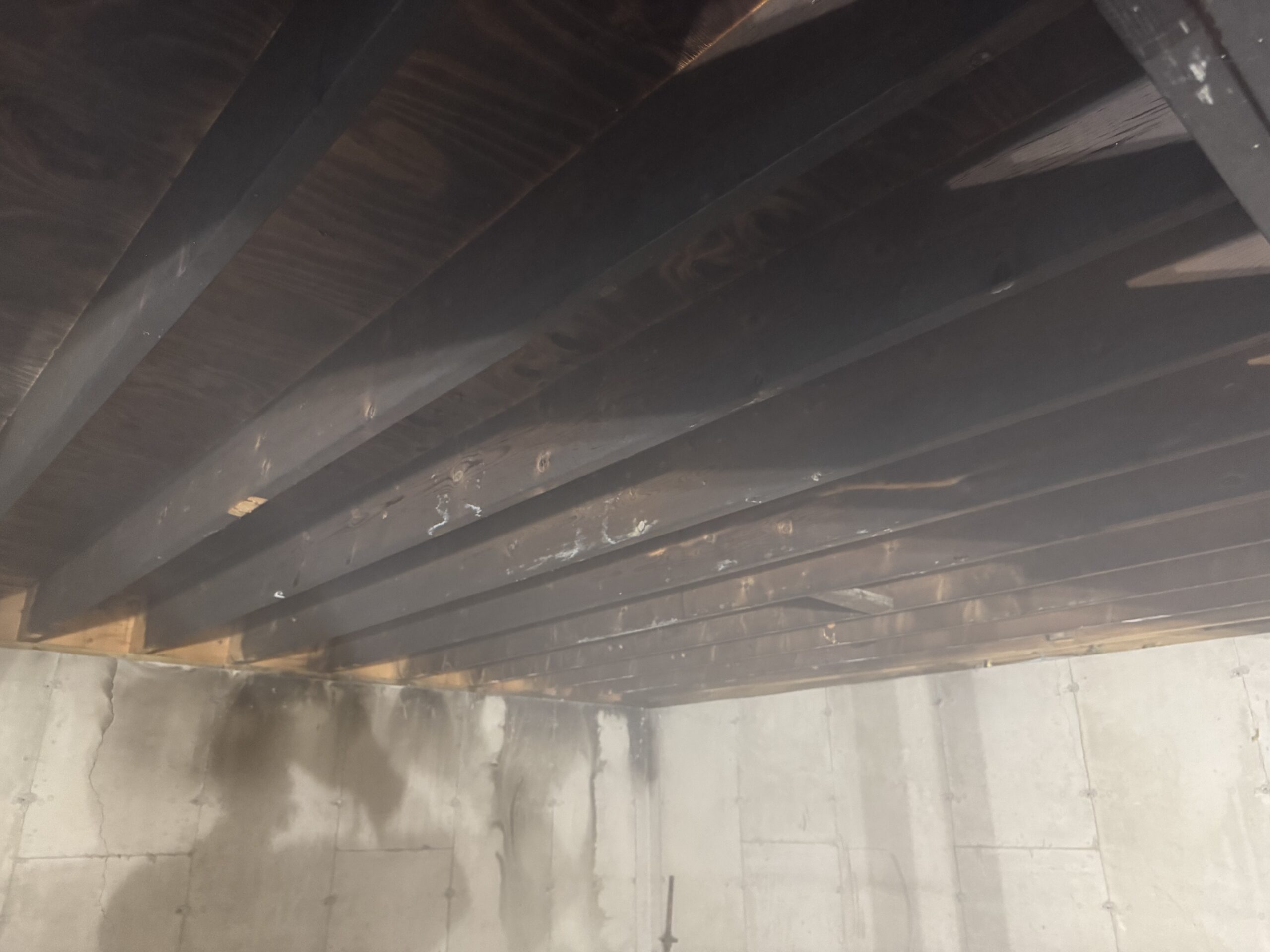Fire Damage Restoration – Before & After Sandblasting Burned home before and after sandblasting restoration by Green Mountain Sandblasting and Powder Coating LLC for Phase Two Construction