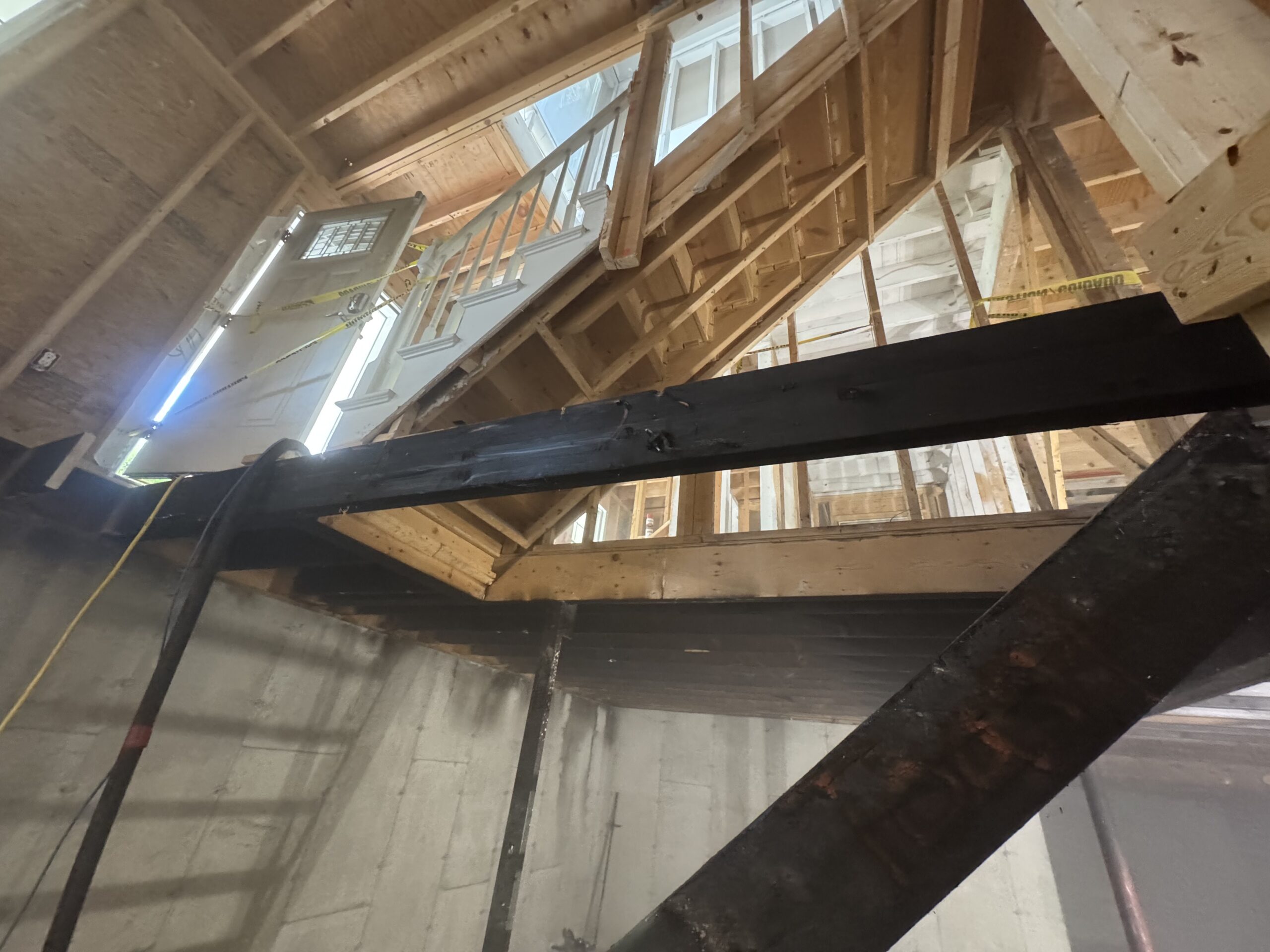 Fire Damage Restoration – Before & After Sandblasting Burned home before and after sandblasting restoration by Green Mountain Sandblasting and Powder Coating LLC for Phase Two Construction