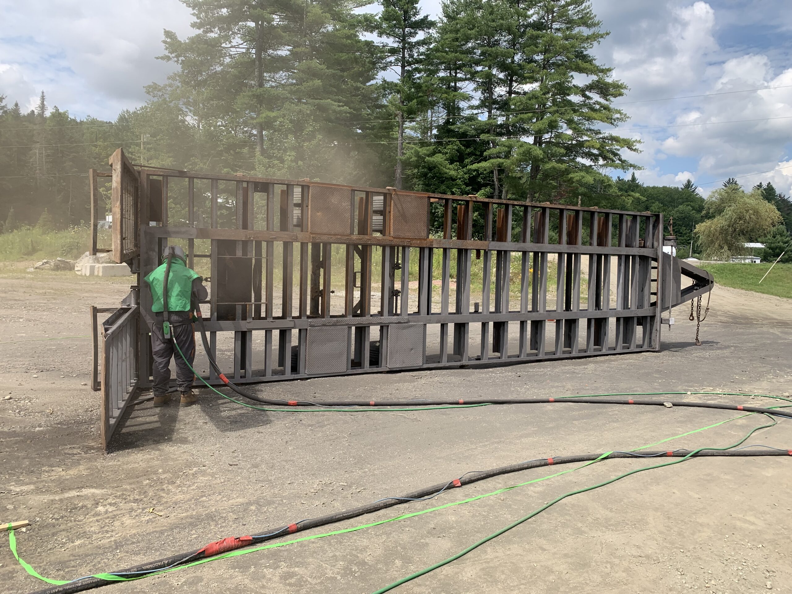 14-Ton Equipment Trailer Sandblasting – Waitsfield, Vermont Before and after sandblasting of a 14-ton equipment trailer in Waitsfield Vermont