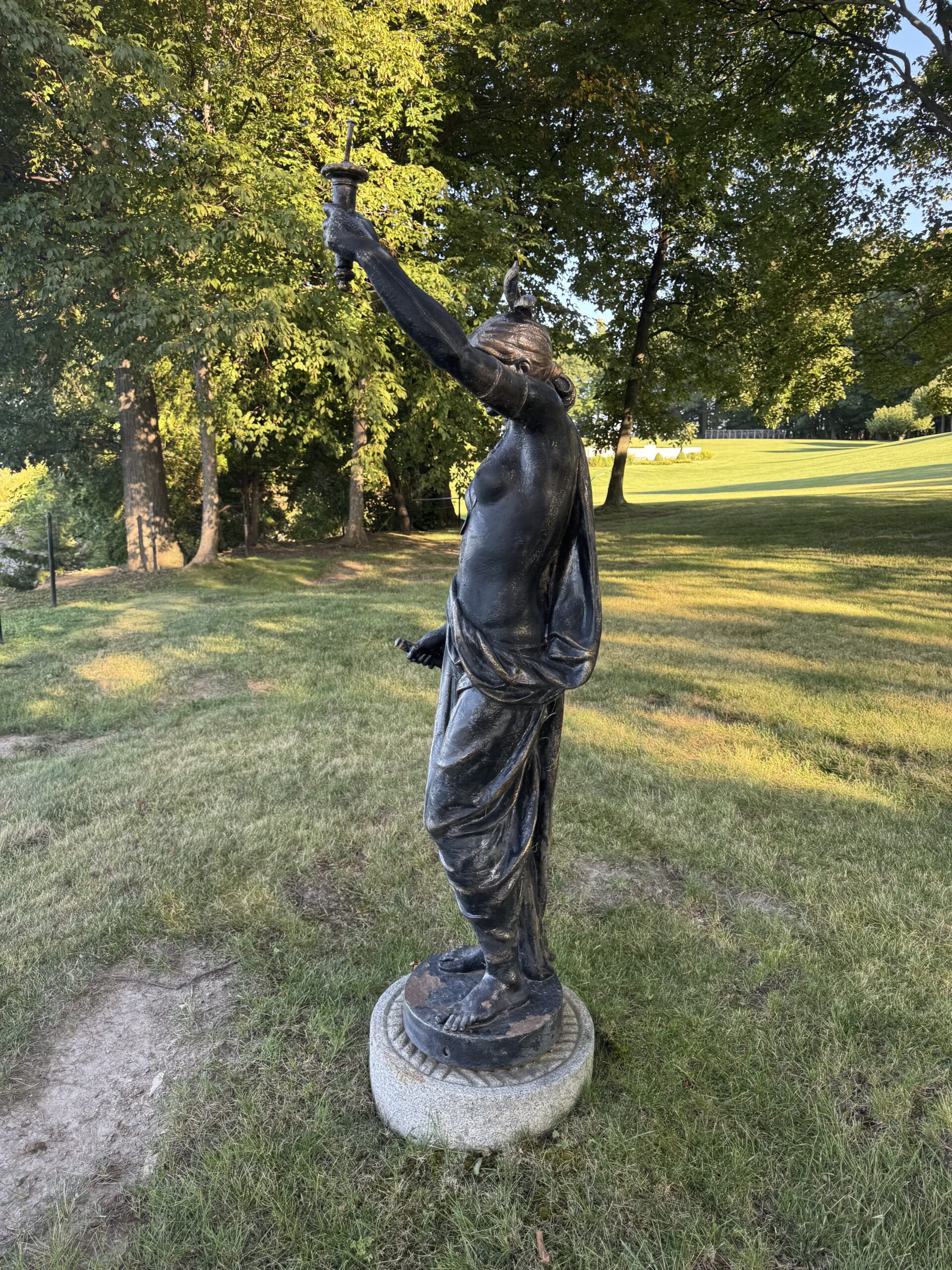 Six-Foot Indian Statue Restoration – Sandblasting & Painting Six-foot Indian statue restored by sandblasting to bare substrate and refinishing in black.