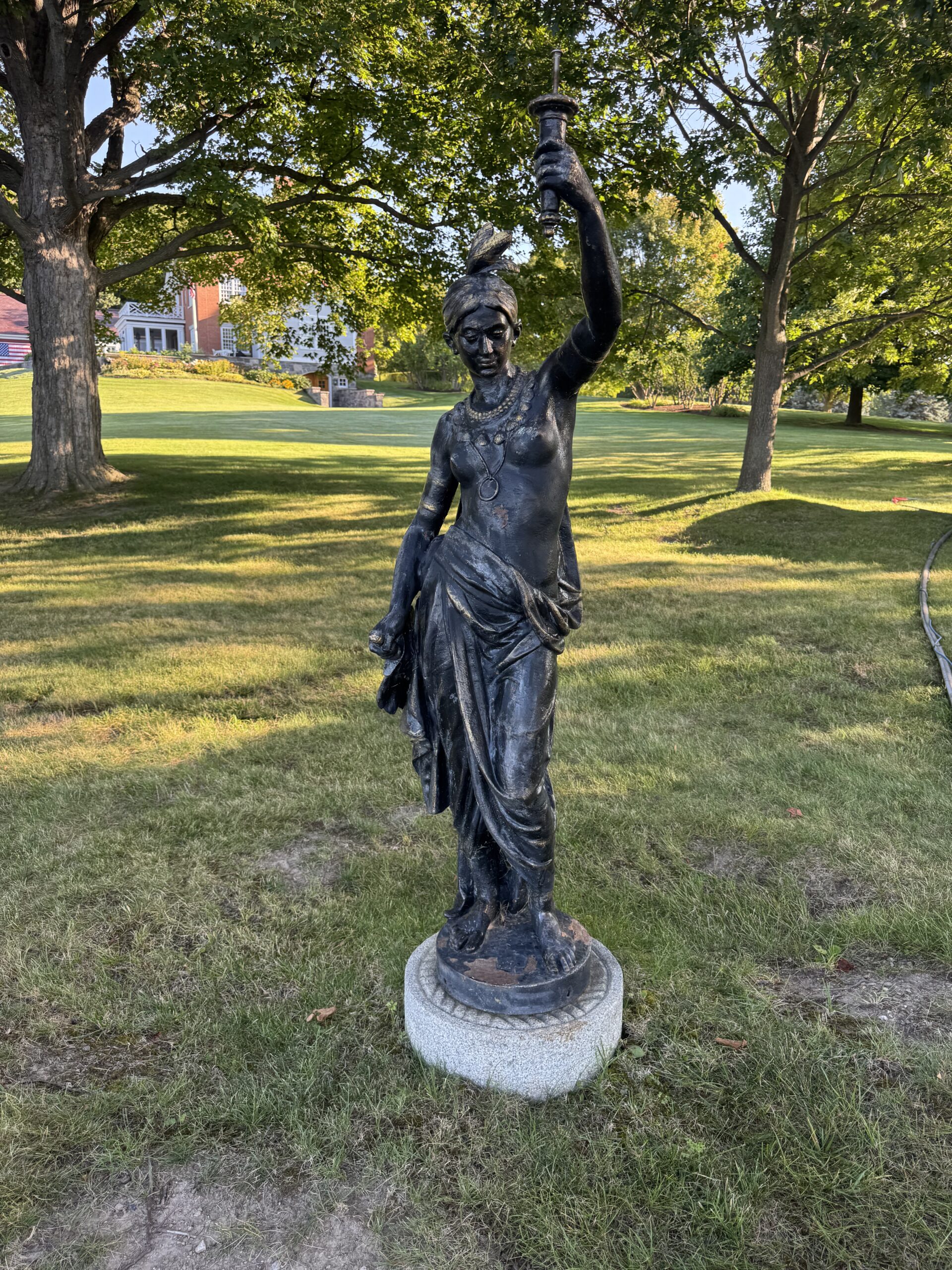 Six-Foot Indian Statue Restoration – Sandblasting & Painting Six-foot Indian statue restored by sandblasting to bare substrate and refinishing in black.