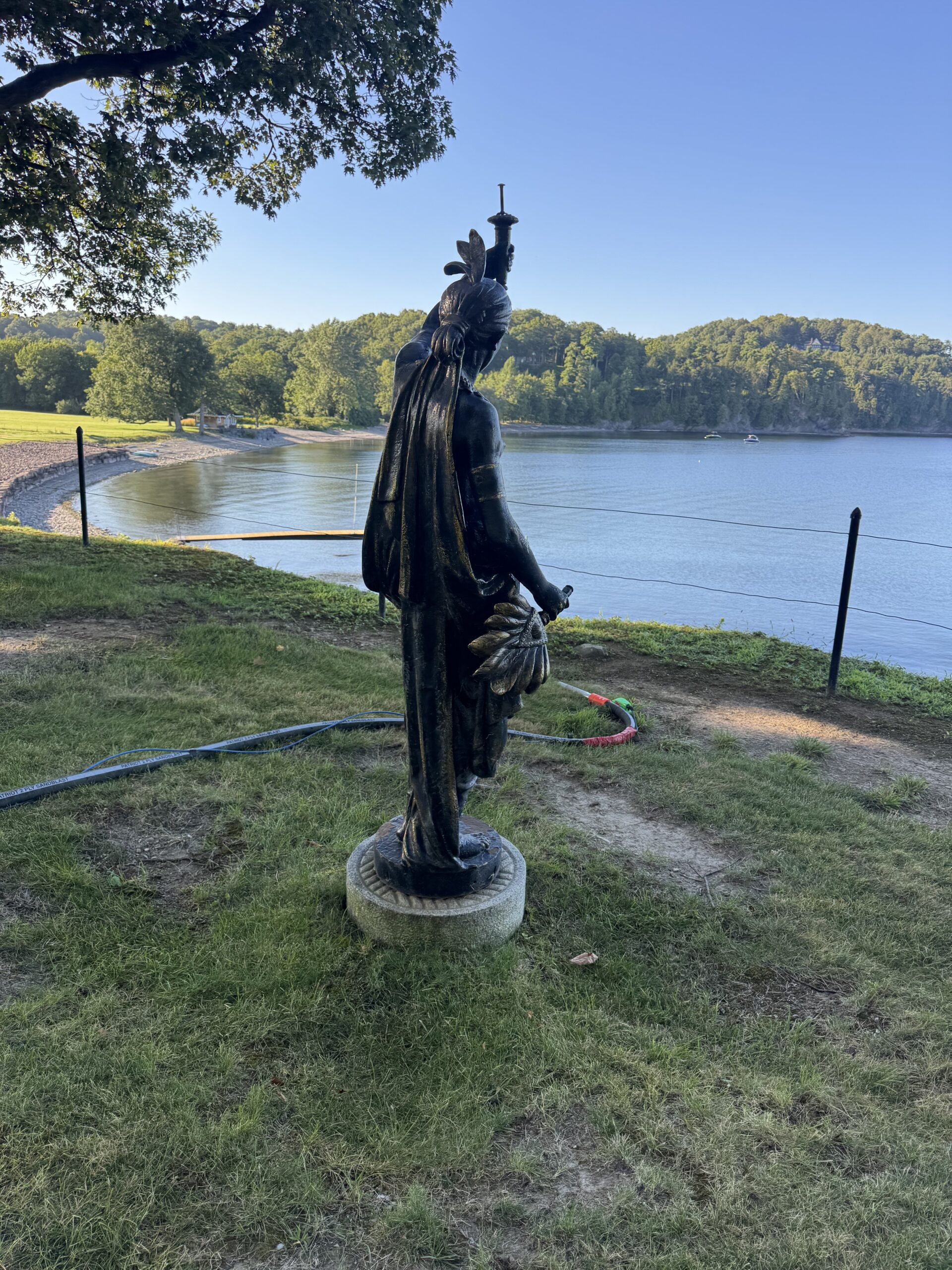 Six-Foot Indian Statue Restoration – Sandblasting & Painting Six-foot Indian statue restored by sandblasting to bare substrate and refinishing in black.