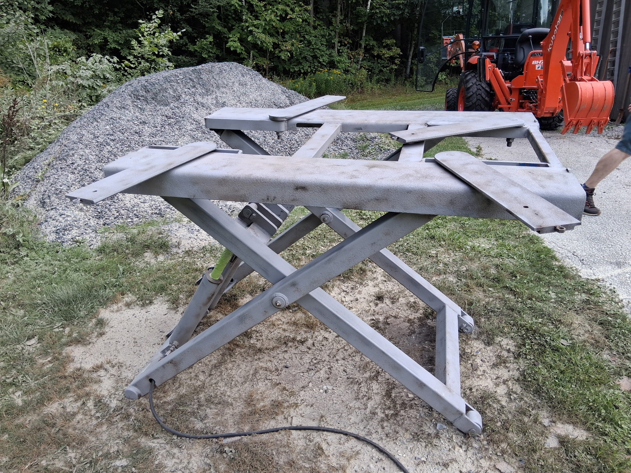 Old Lift Sandblasting & Restoration – Rutland, Vermont Before during and after restoration of a rusty old lift in Rutland Vermont showing the lift before sandblasting, after rust removal, and after custom painting