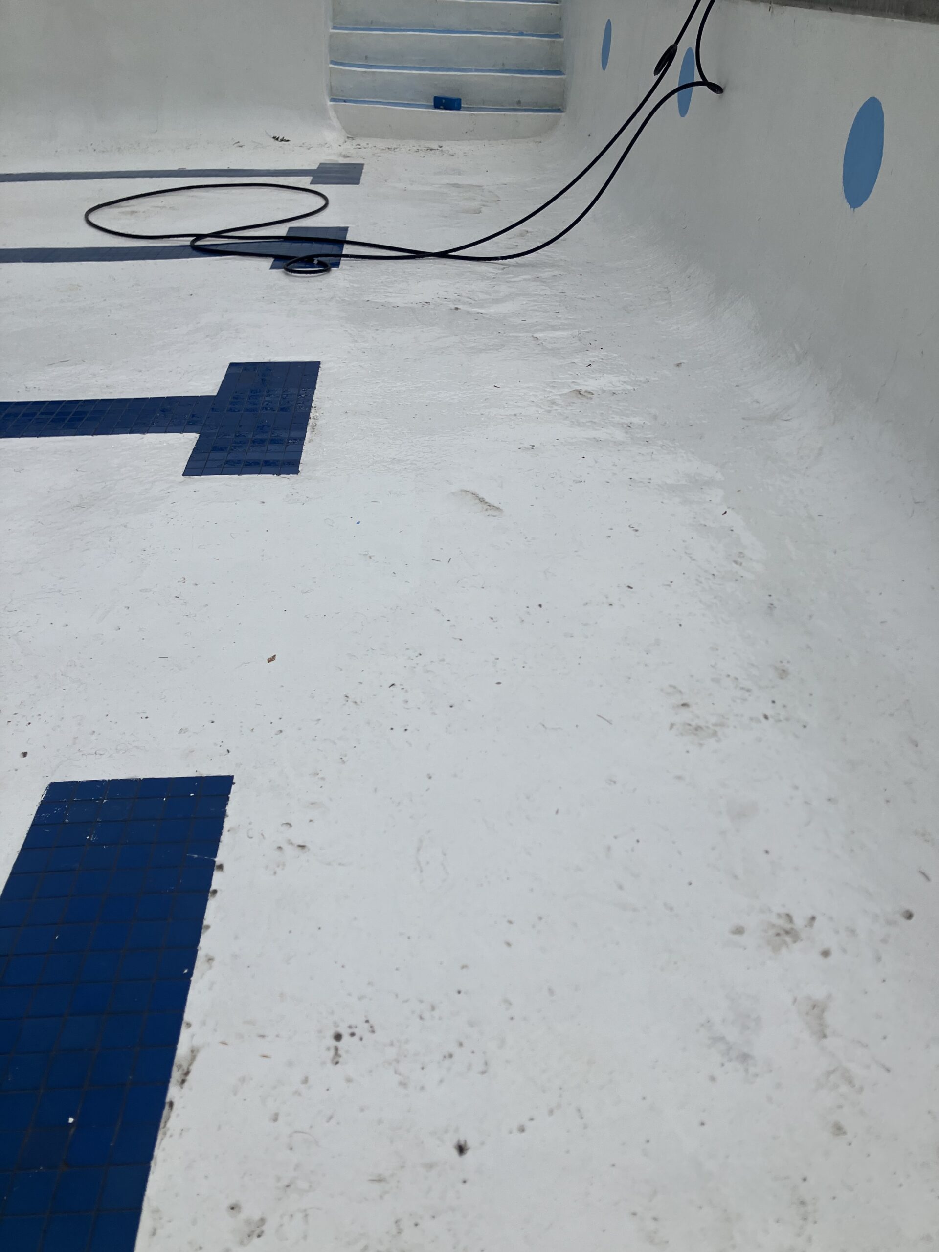 Swimming Pool Paint Etching – Smugglers’ Notch Resort, Jeffersonville, Vermont Swimming pool at Smugglers’ Notch Resort in Jeffersonville Vermont professionally sandblasted to etch the existing painted surface for a new coating