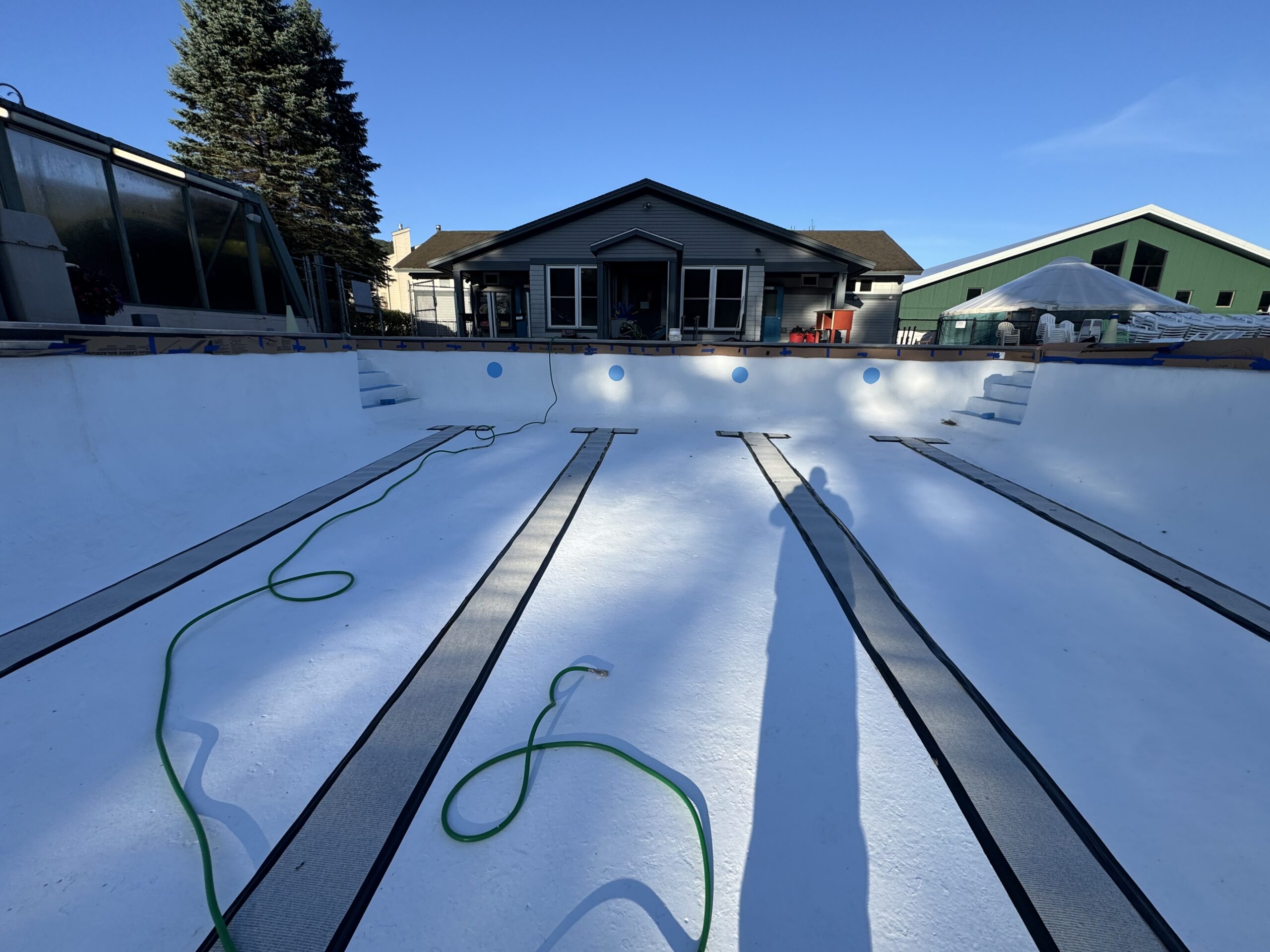 Swimming Pool Paint Etching – Smugglers’ Notch Resort, Jeffersonville, Vermont Swimming pool at Smugglers’ Notch Resort in Jeffersonville Vermont professionally sandblasted to etch the existing painted surface for a new coating