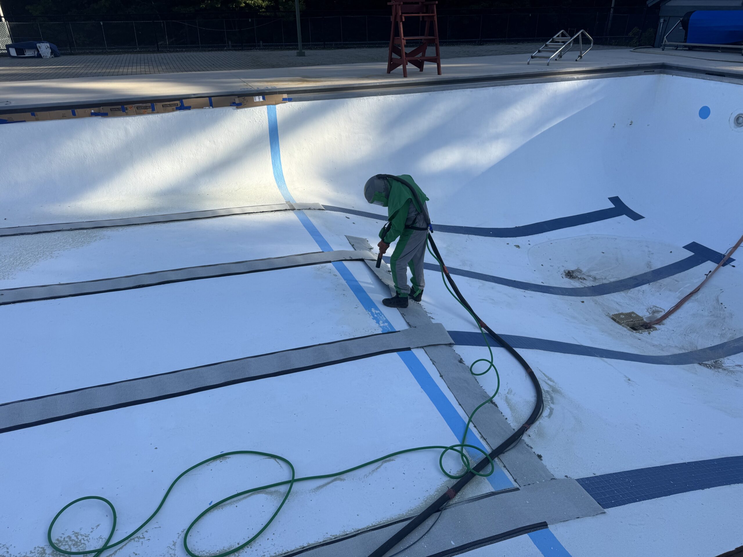 Swimming Pool Paint Etching – Smugglers’ Notch Resort, Jeffersonville, Vermont Swimming pool at Smugglers’ Notch Resort in Jeffersonville Vermont professionally sandblasted to etch the existing painted surface for a new coating