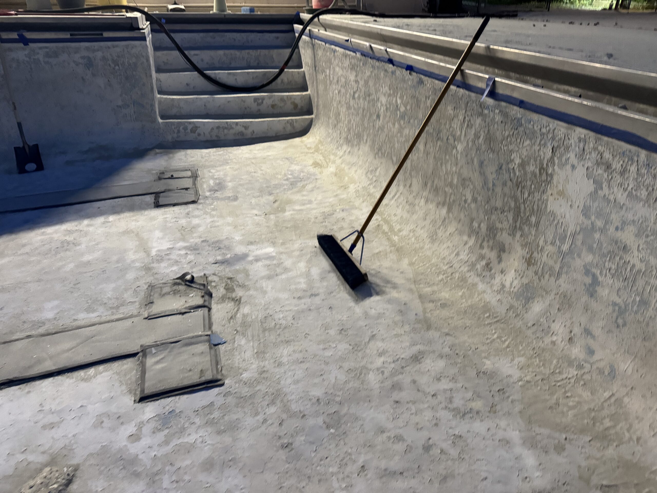 Swimming Pool Paint Etching – Smugglers’ Notch Resort, Jeffersonville, Vermont Swimming pool at Smugglers’ Notch Resort in Jeffersonville Vermont professionally sandblasted to etch the existing painted surface for a new coating